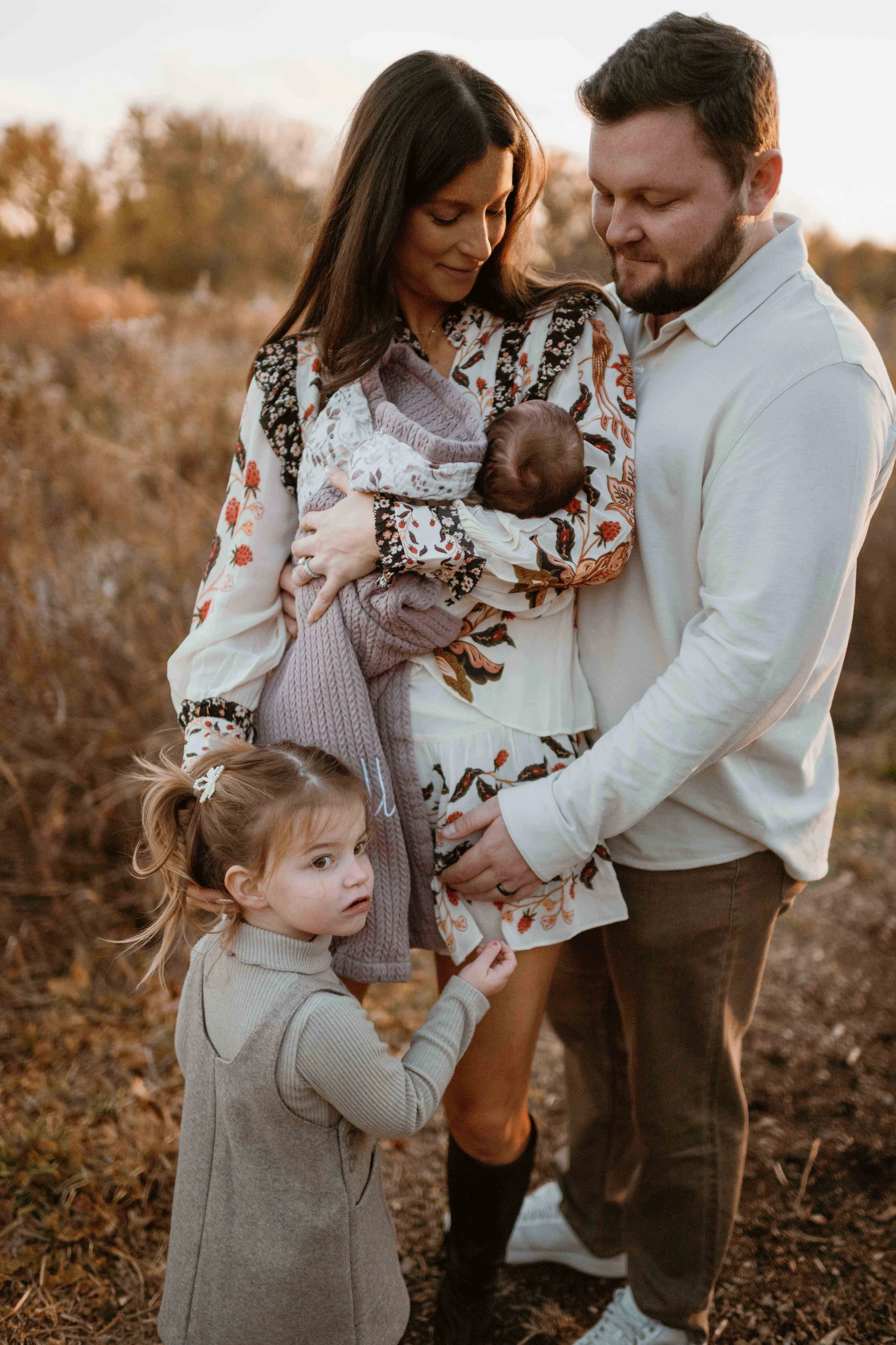 family of four hugging atMorton Arboretum Lisle IL  