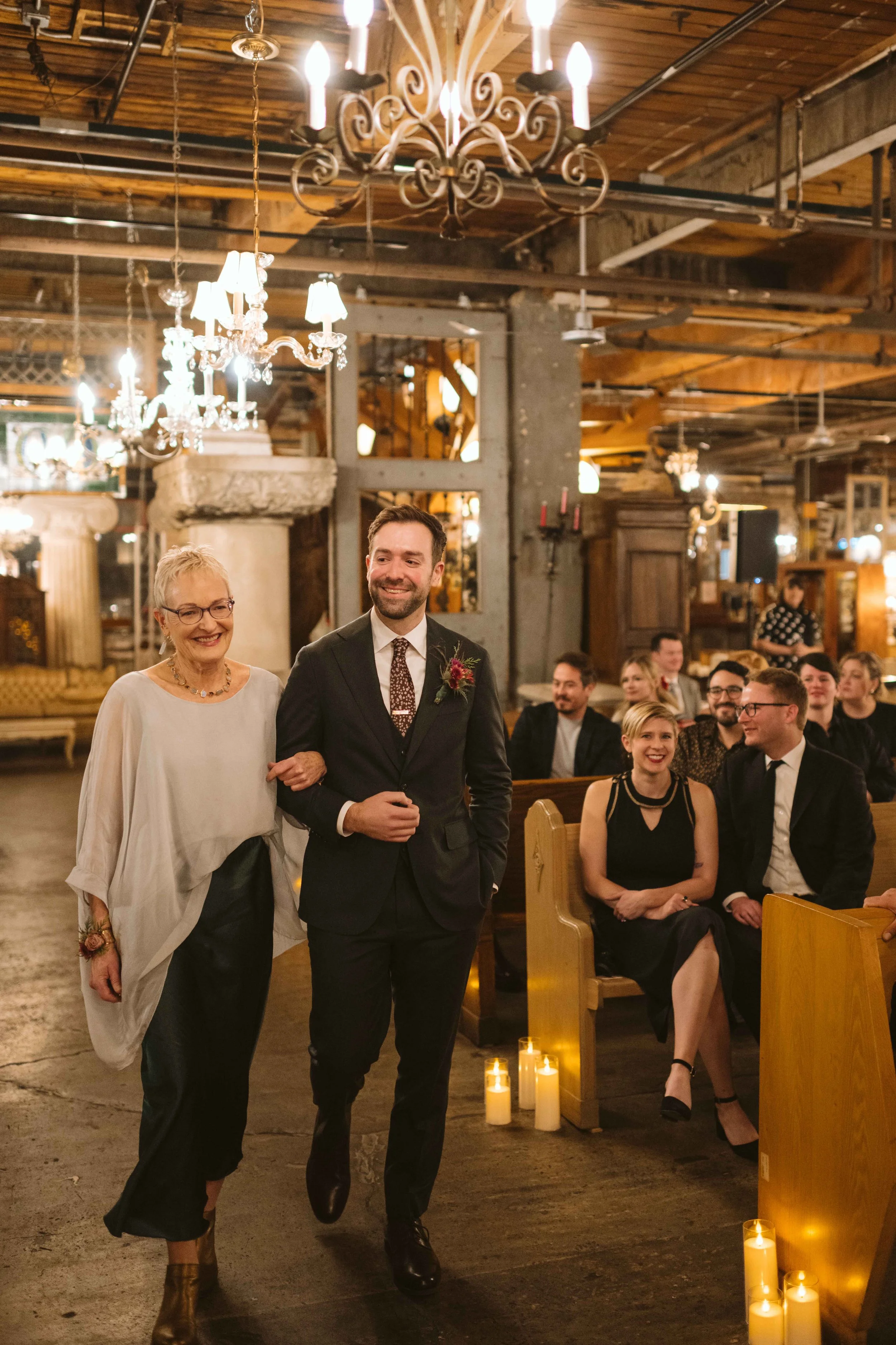 Salvage One Chicago ceremony groom walking his mom down the aisle
