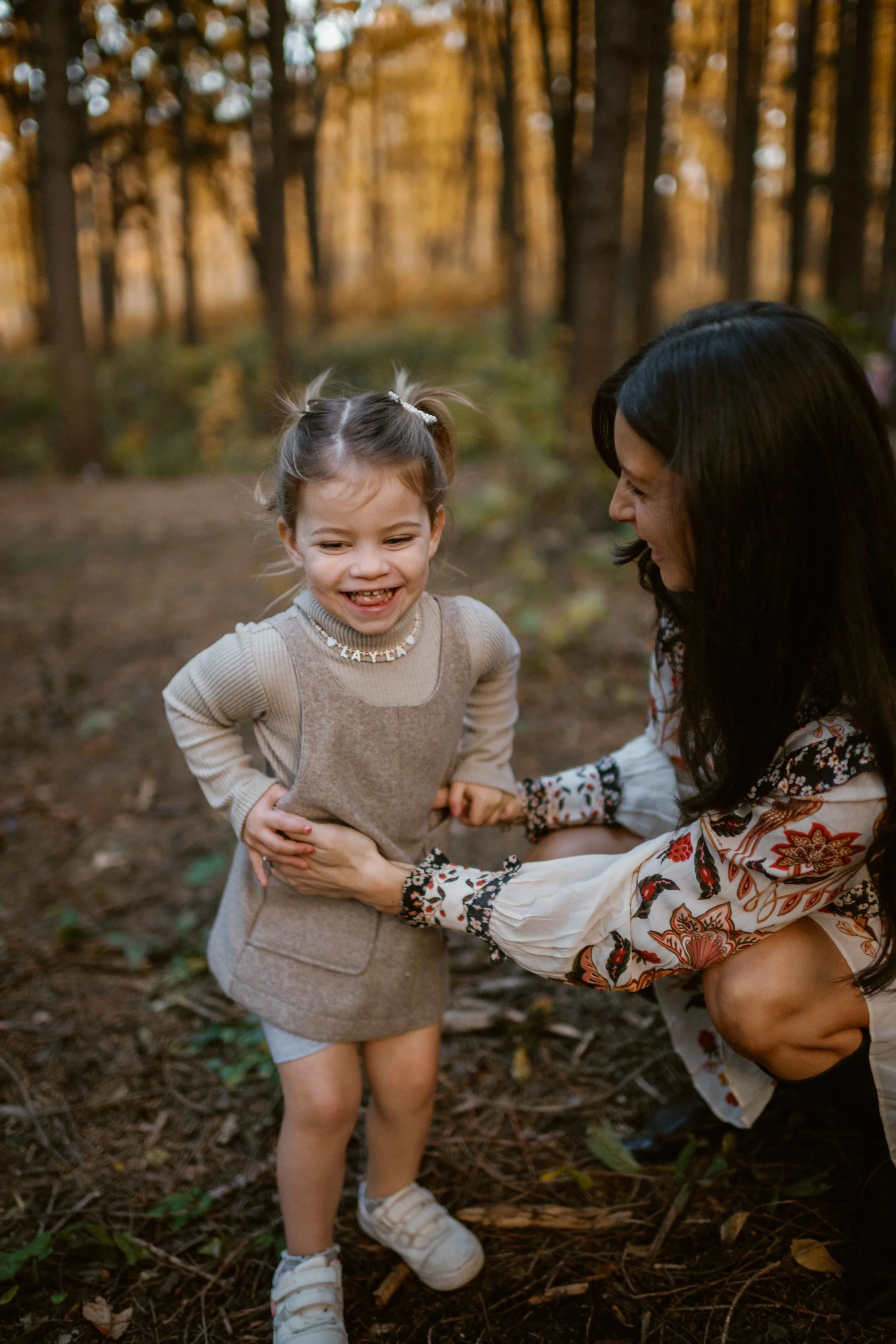mommy tickling daughter at Morton Arboretum Lisle IL 