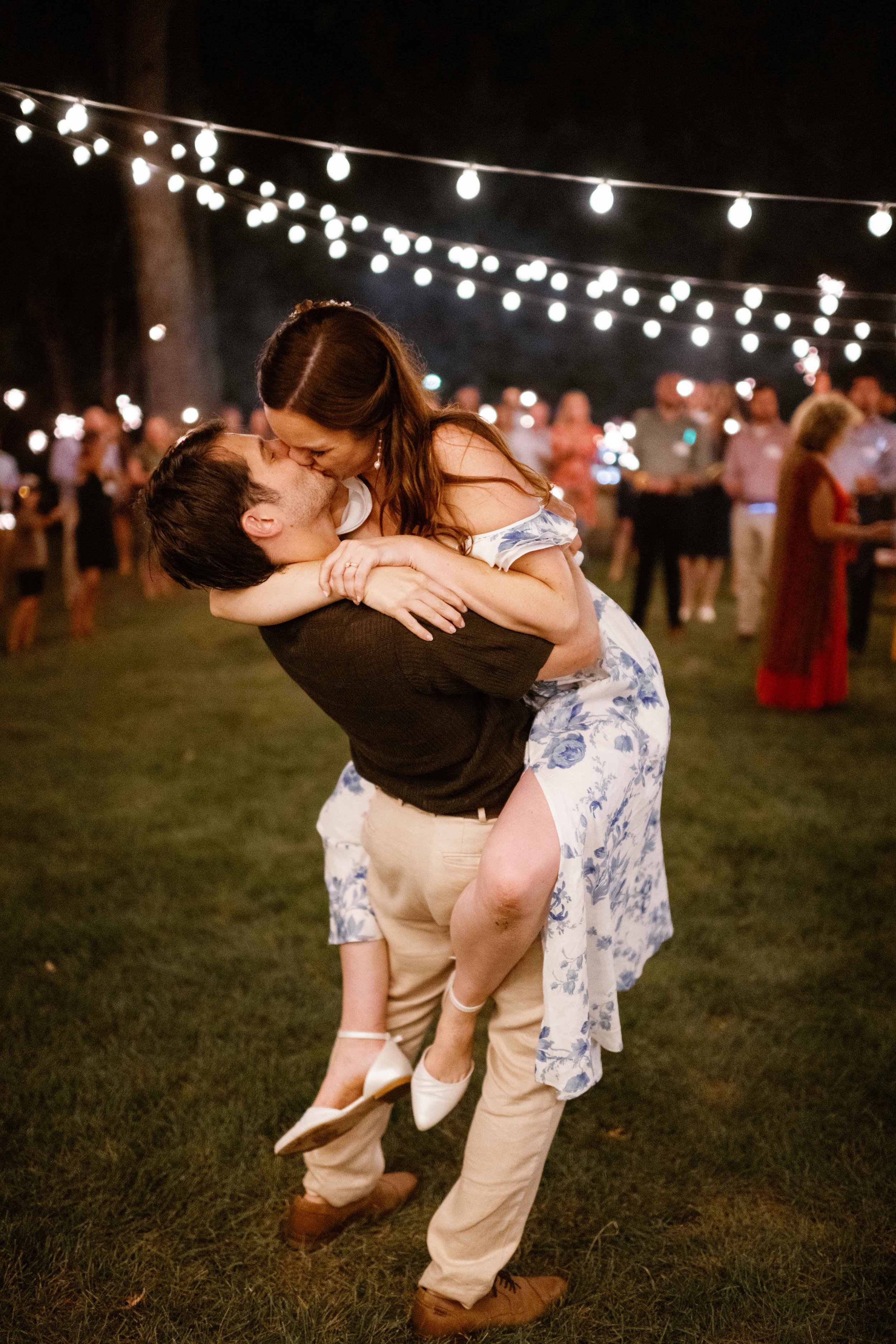Chicago suburb wedding of bride and groom kissing during their first dance