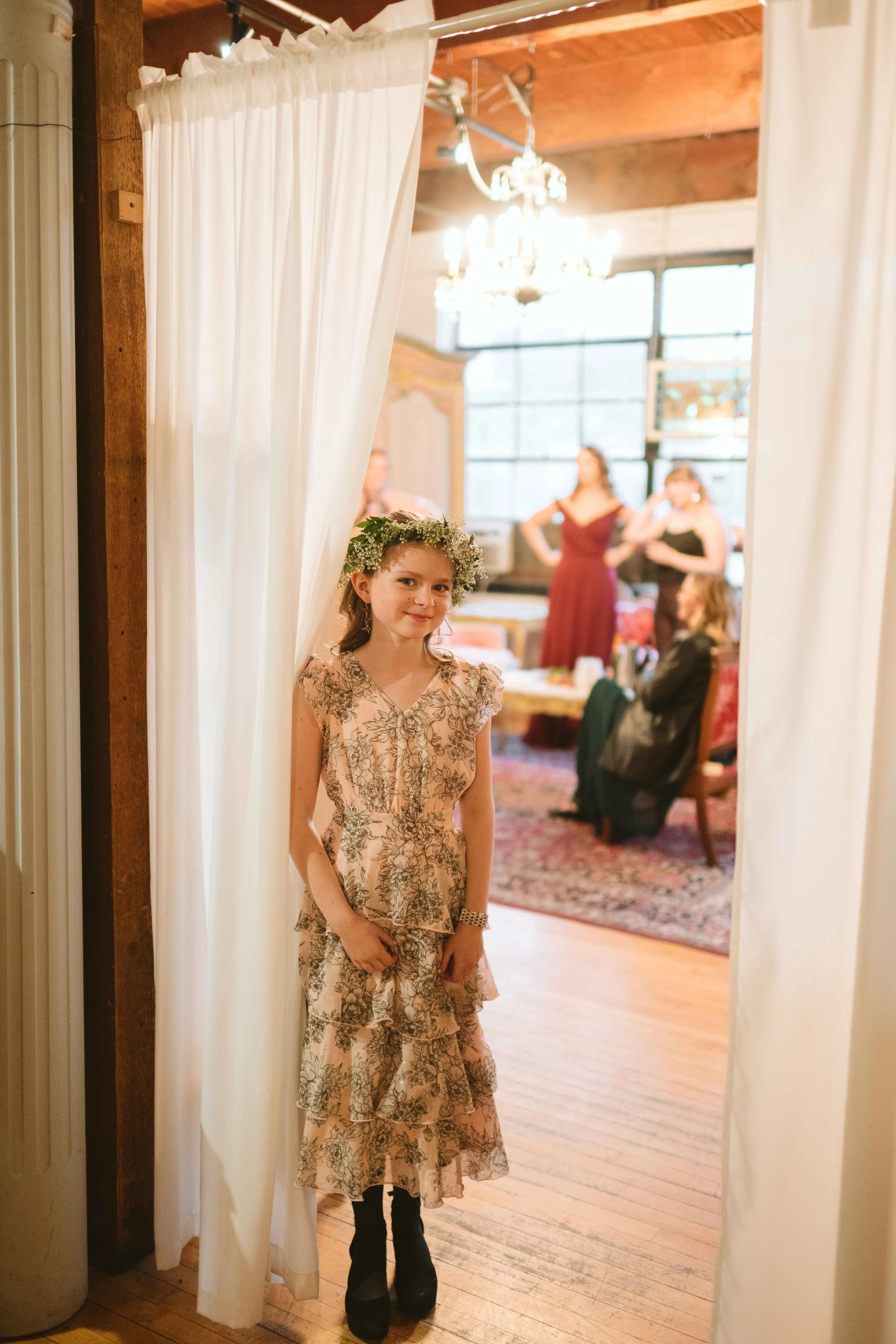 Flower girl outside the bridal suite at Salvage One in Chicago IL