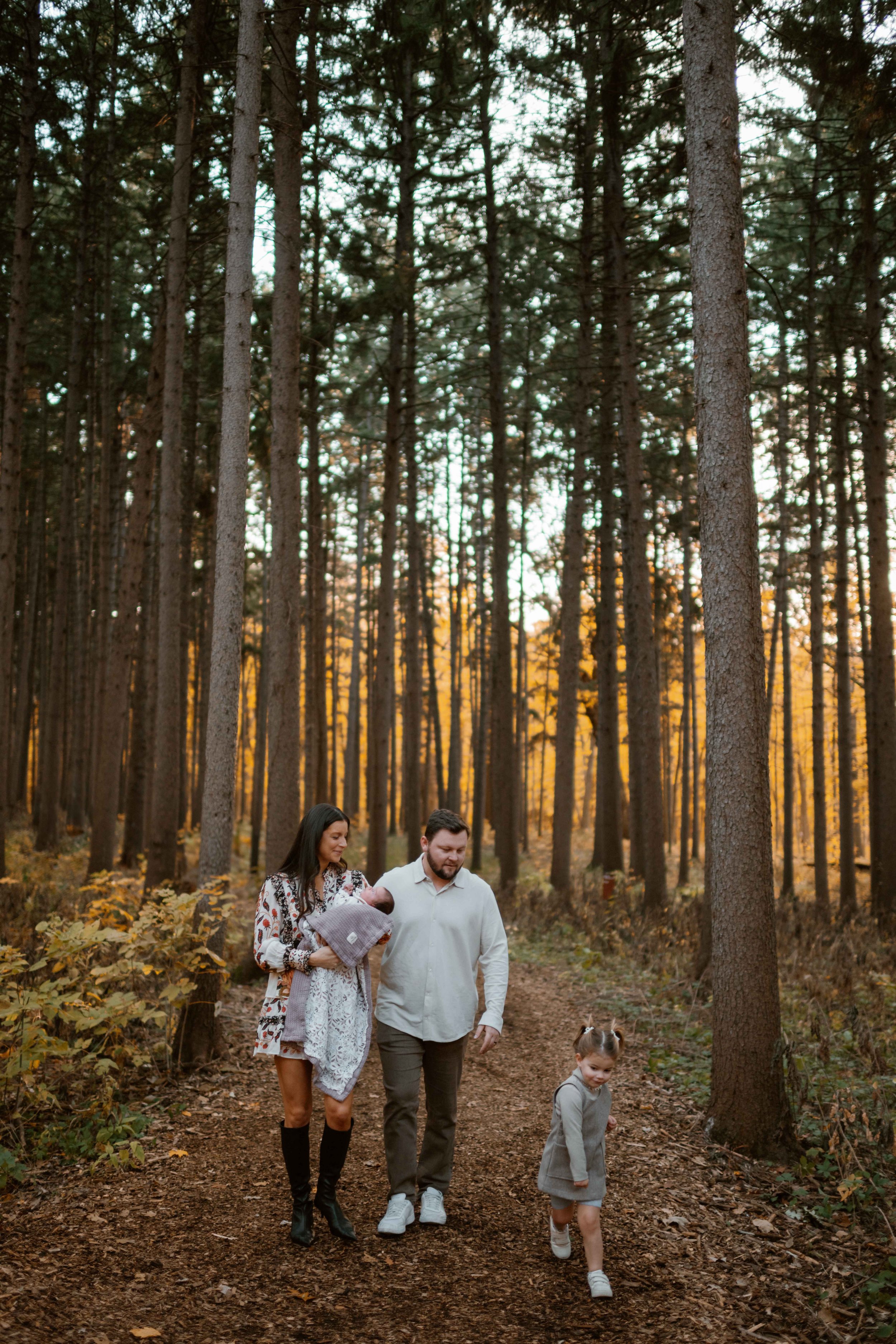 fall photo of family walking at Morton Arboretum Lisle IL 