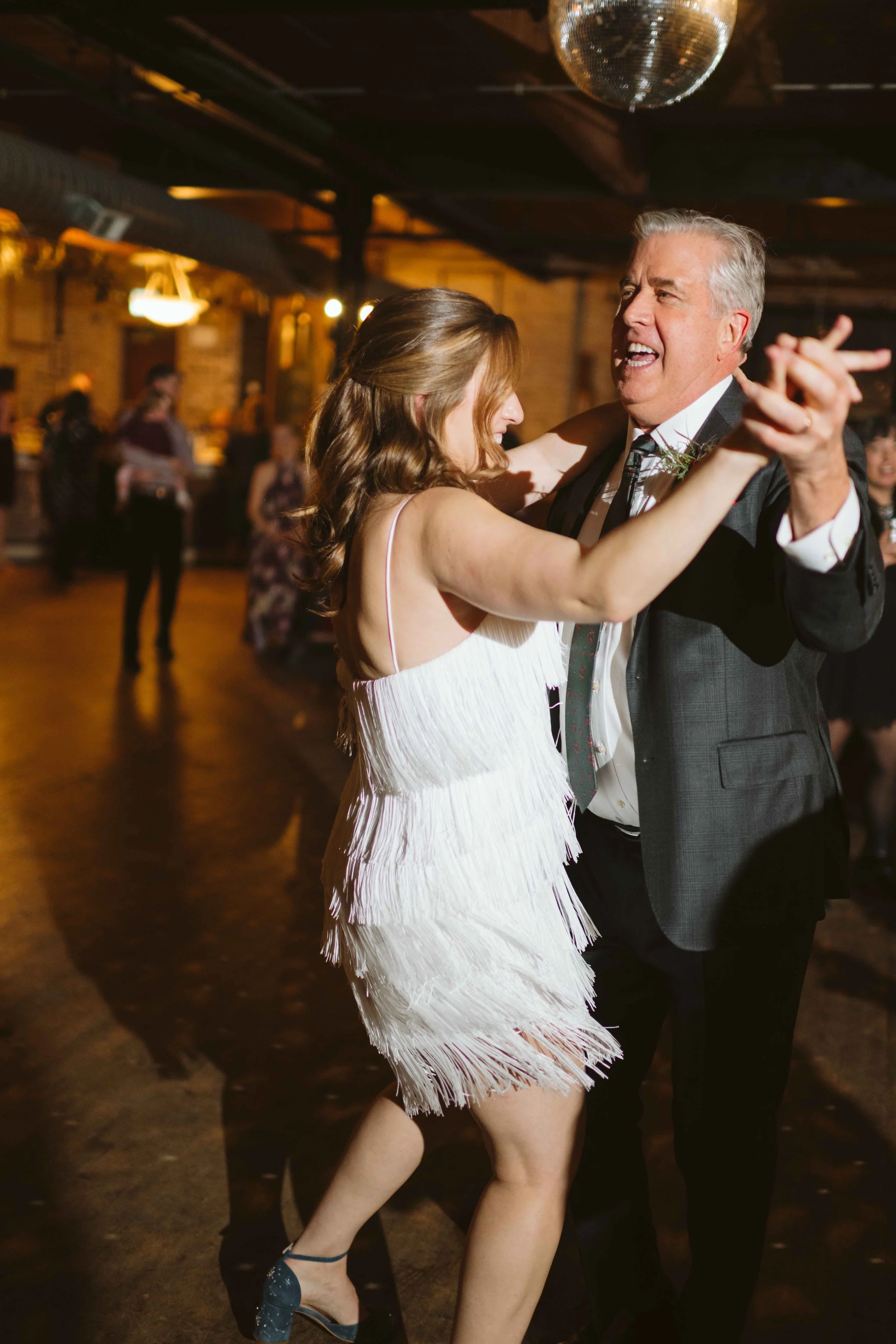 salvage one chicago wedding reception bride and dad dancing