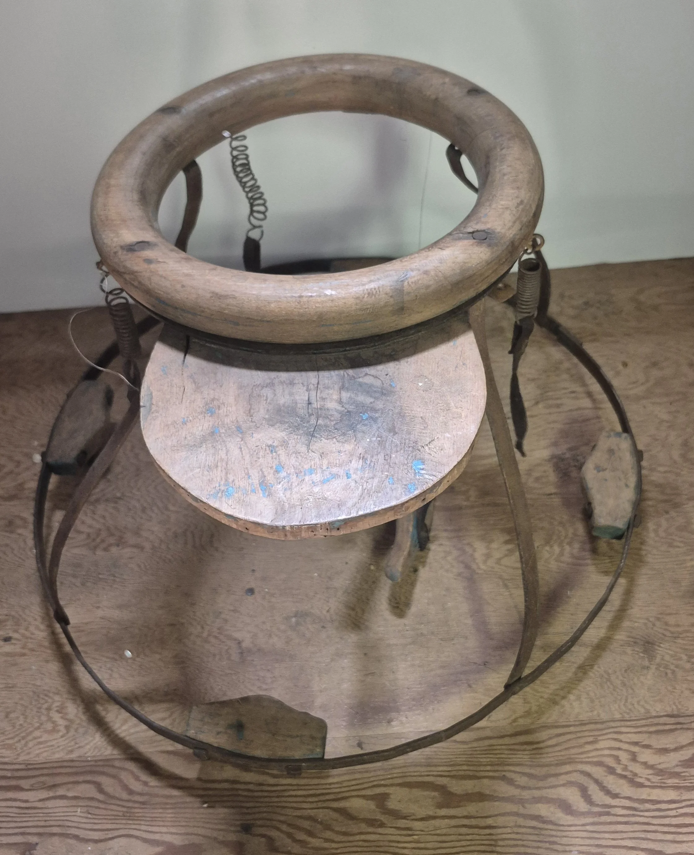  Baby Tender, early 20th century  A wood and metal baby tender from the early 20th century, donated to our collection by Pamela Woods.