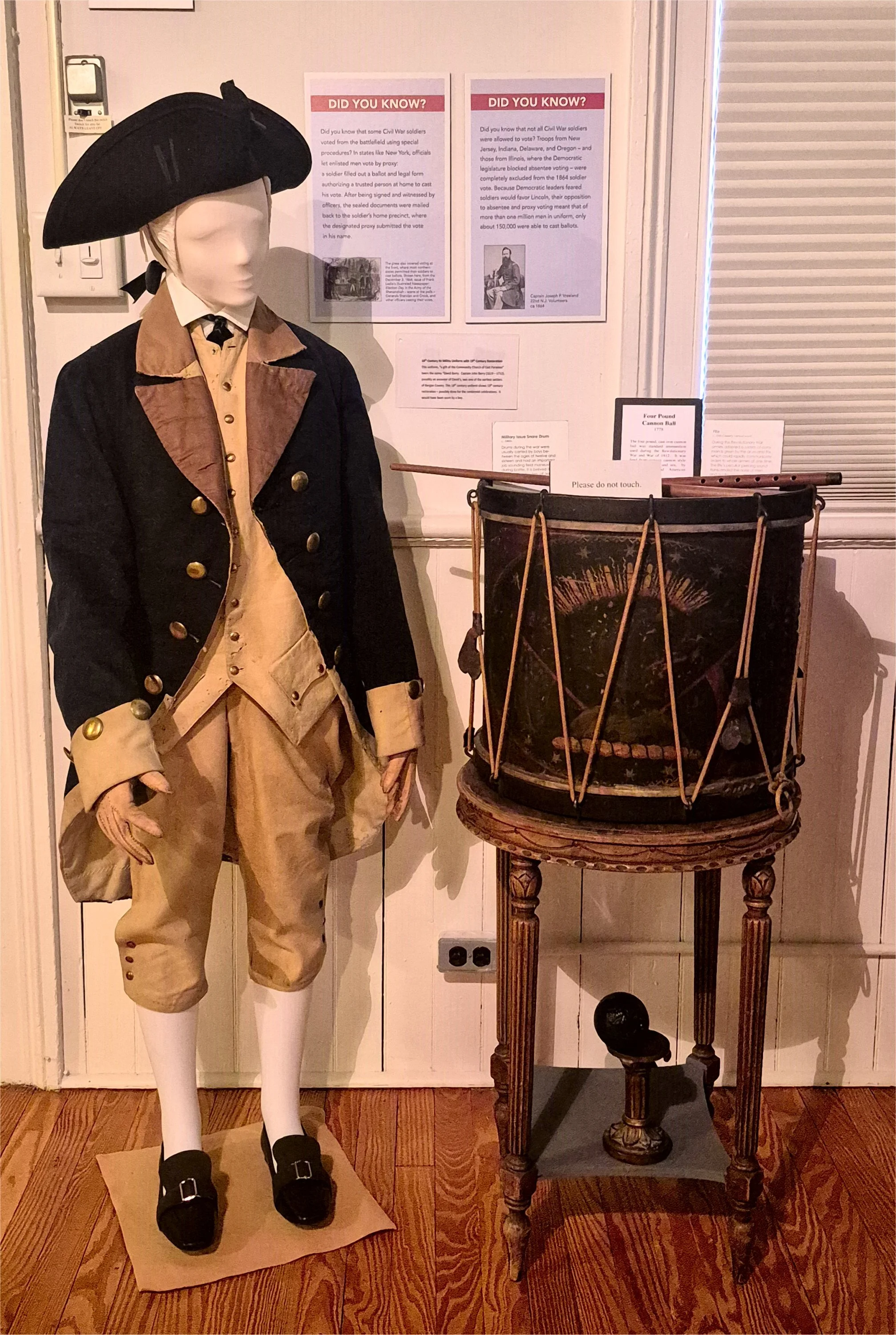  NJ Militia mannequin  18th-century NJ militia uniform with 19th century restoration.  This uniform, “a gift of the Community Church in East Paramus” bears the name “David Berry.” Captain John Berry (1619 – 1712), possibly an ancestor of David’s, was