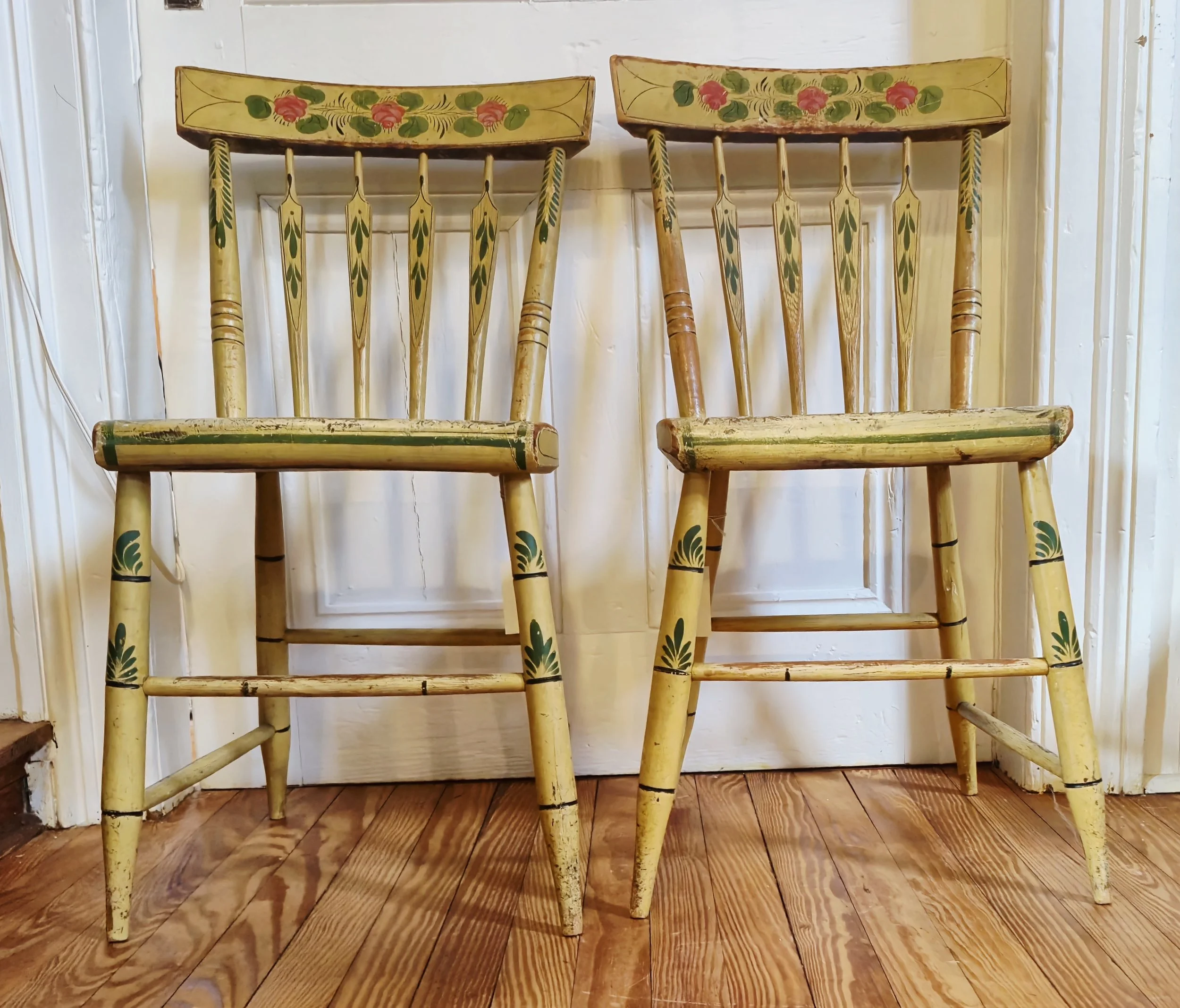  Two Hitchcock Chairs, 1818  Solid plank, saddle-set, arrow-back chairs with the original mustard paint and stenciling, probably dating to around 1818 to 1820. The Hitchcock Chair Company opened in 1818 in Riverton, CT along the Farmington River. By 