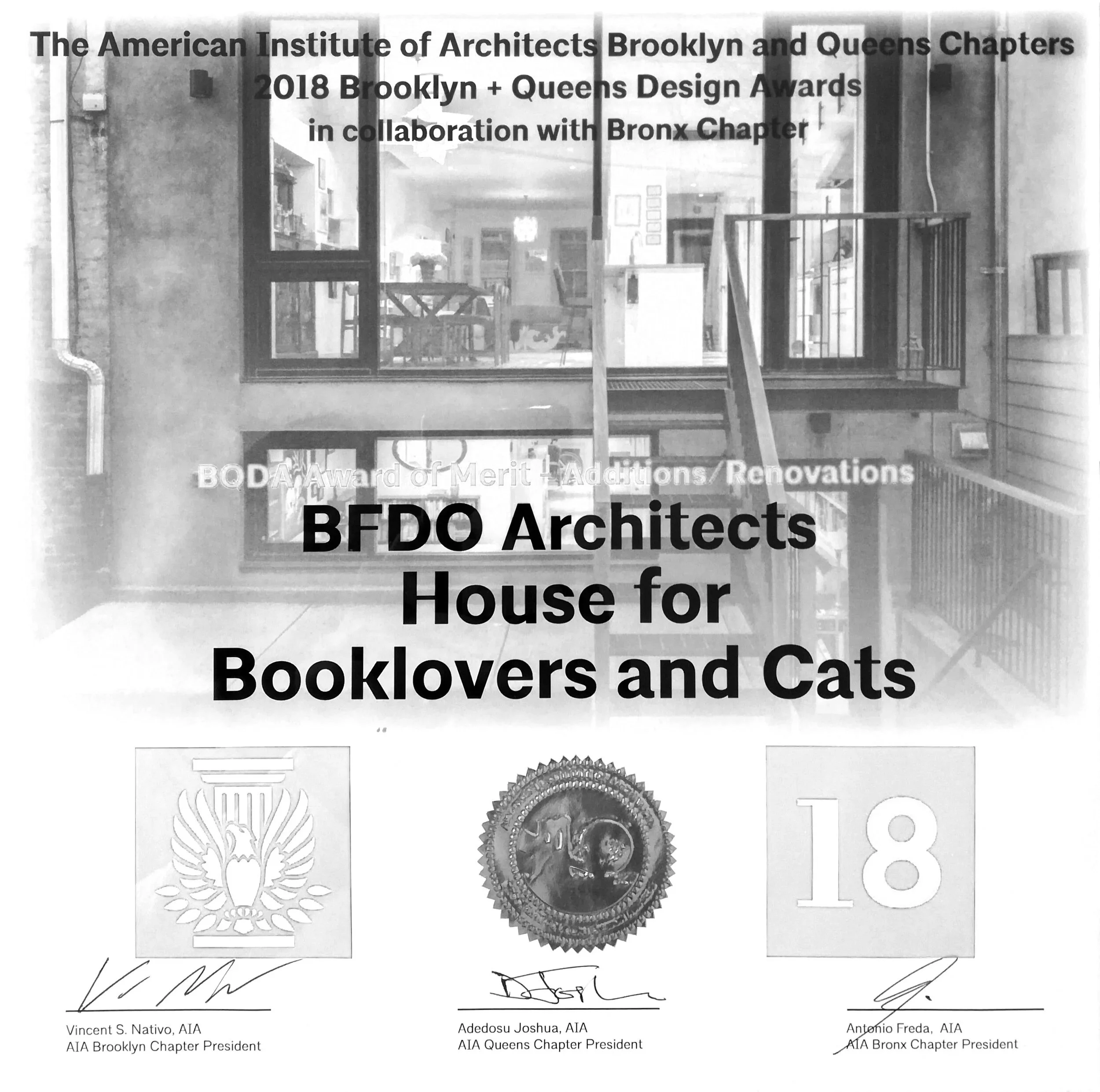 Photograph of a certificate or award document from the American Institute of Architects Brooklyn and Queens Chapters, recognizing the 2018 Brooklyn and Queens Design Awards, in collaboration with Bronx Chapter. The certificate features signatures of 