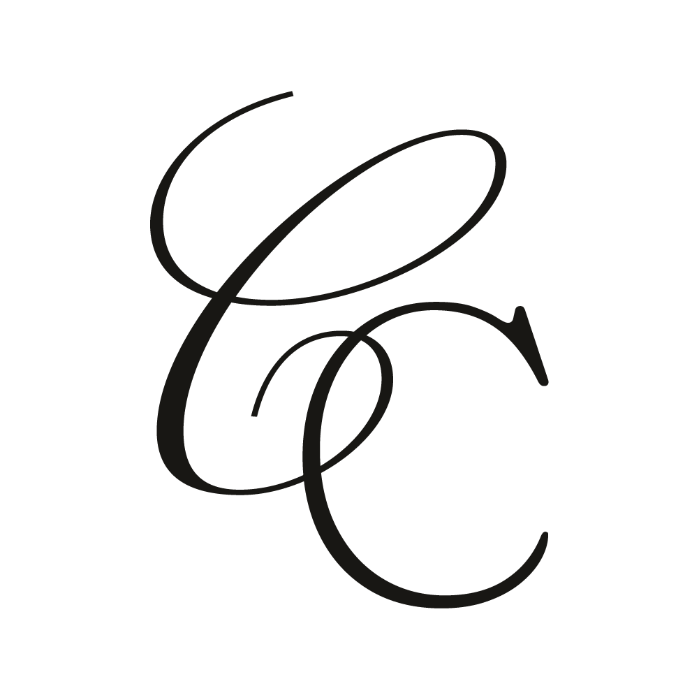 Elegant black monogram of the letters C and C intertwined in a cursive script. Casini Content Wedding Content Creation in Arizona.
