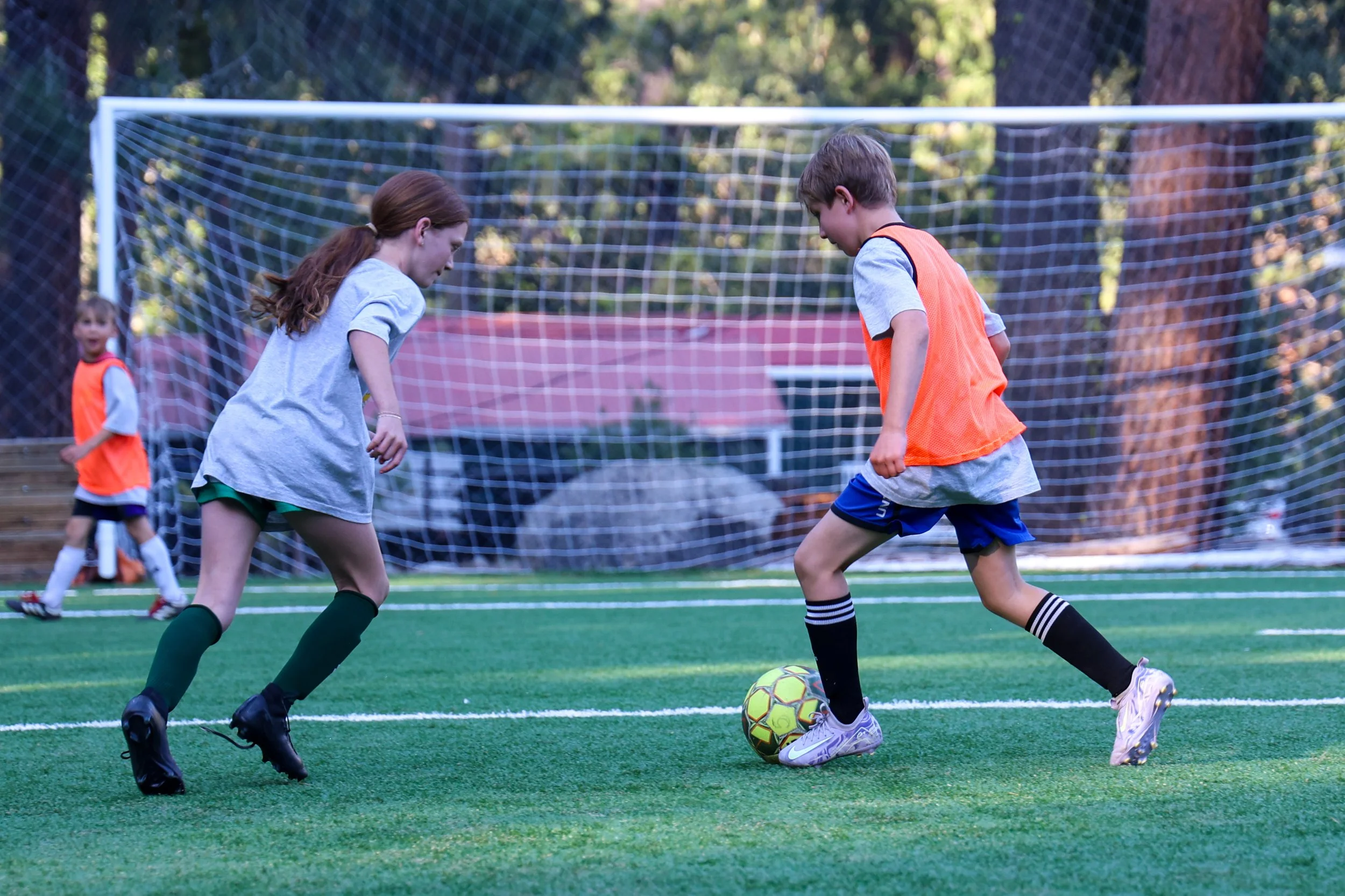 Youth players participating in intermediate soccer training drills