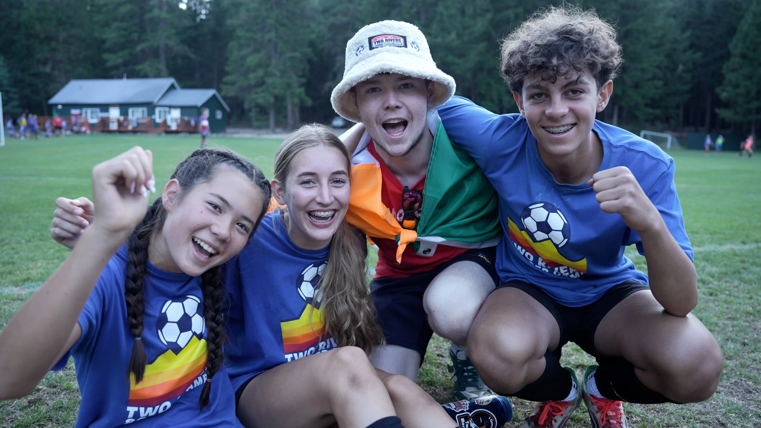 Campers smiling together during summer at Two Rivers Soccer Camp