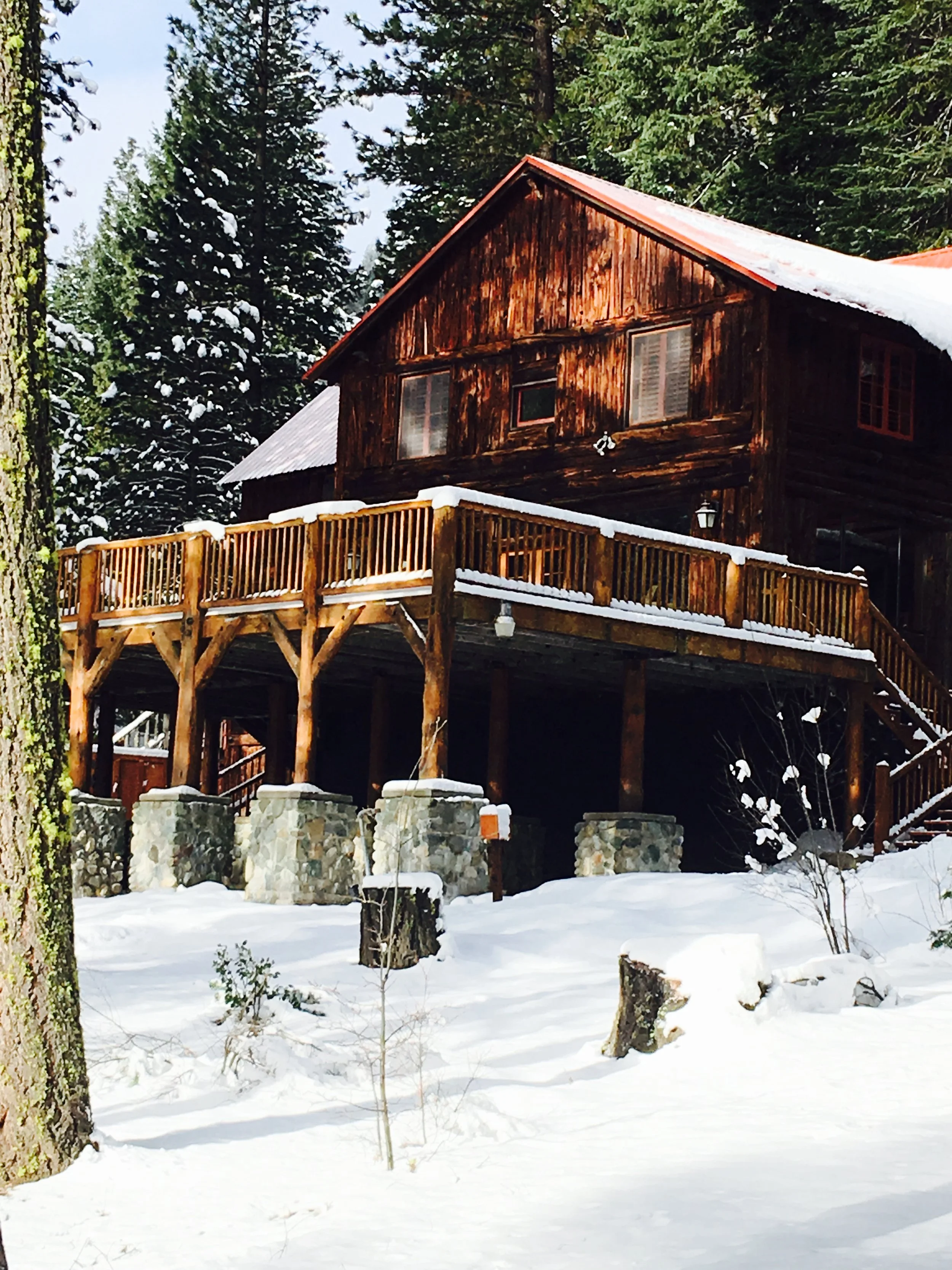 Rustic cabin accommodations at Two Rivers camp