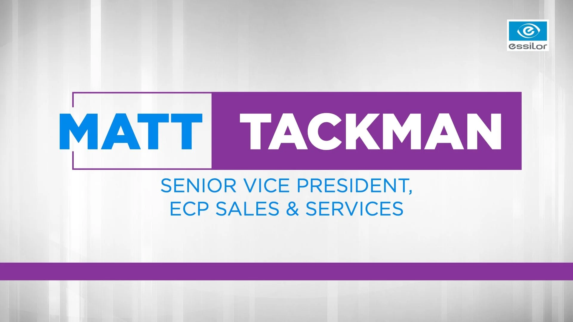 Name tag for Matt Tackman, Senior Vice President of ECP Sales & Services, with a purple and blue color scheme and the Essilor logo in the top right corner.