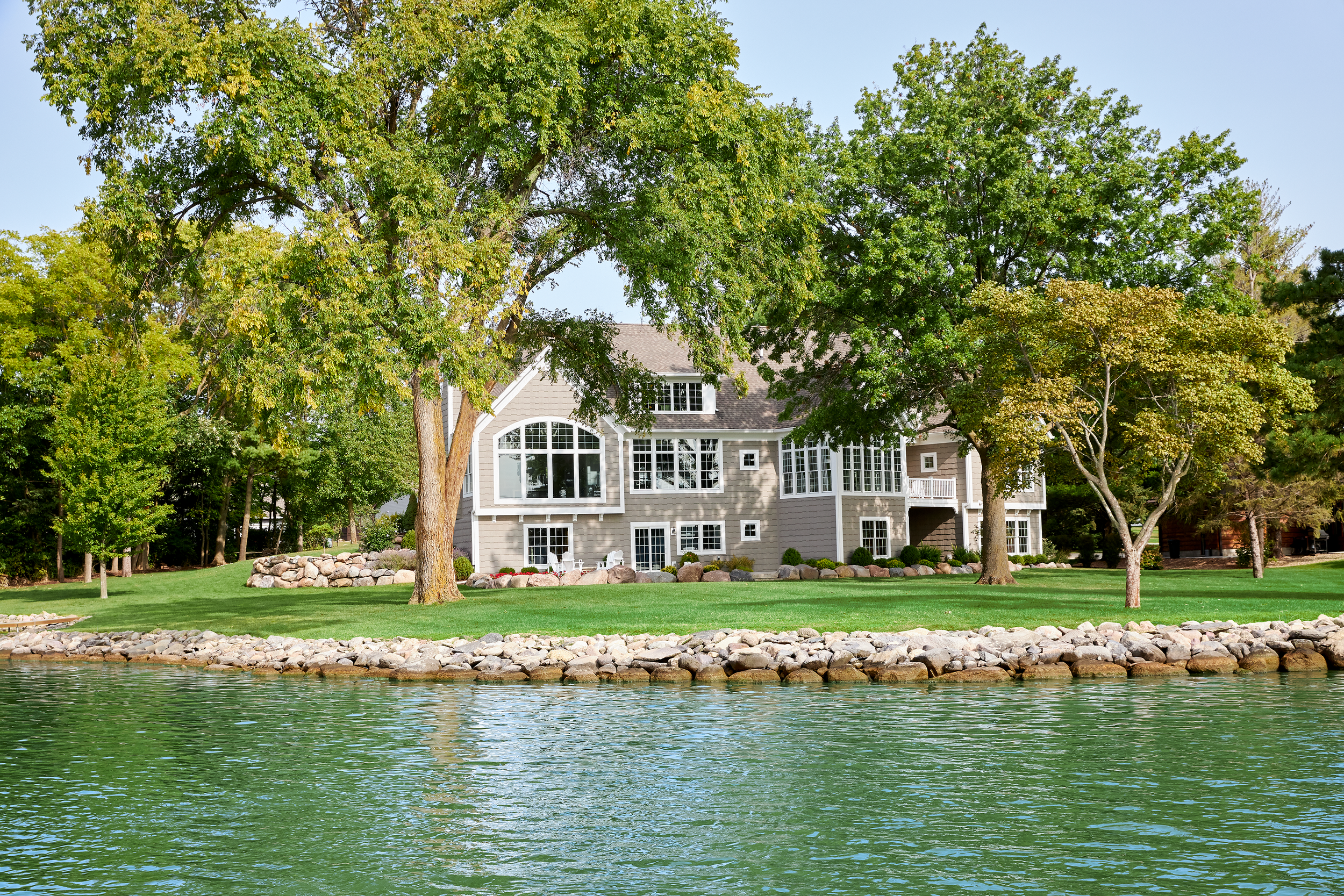 A beautiful lakefront home in Nashville Tennessee with brand new windows from Pella professionally installed by Belle Windows and Doors.