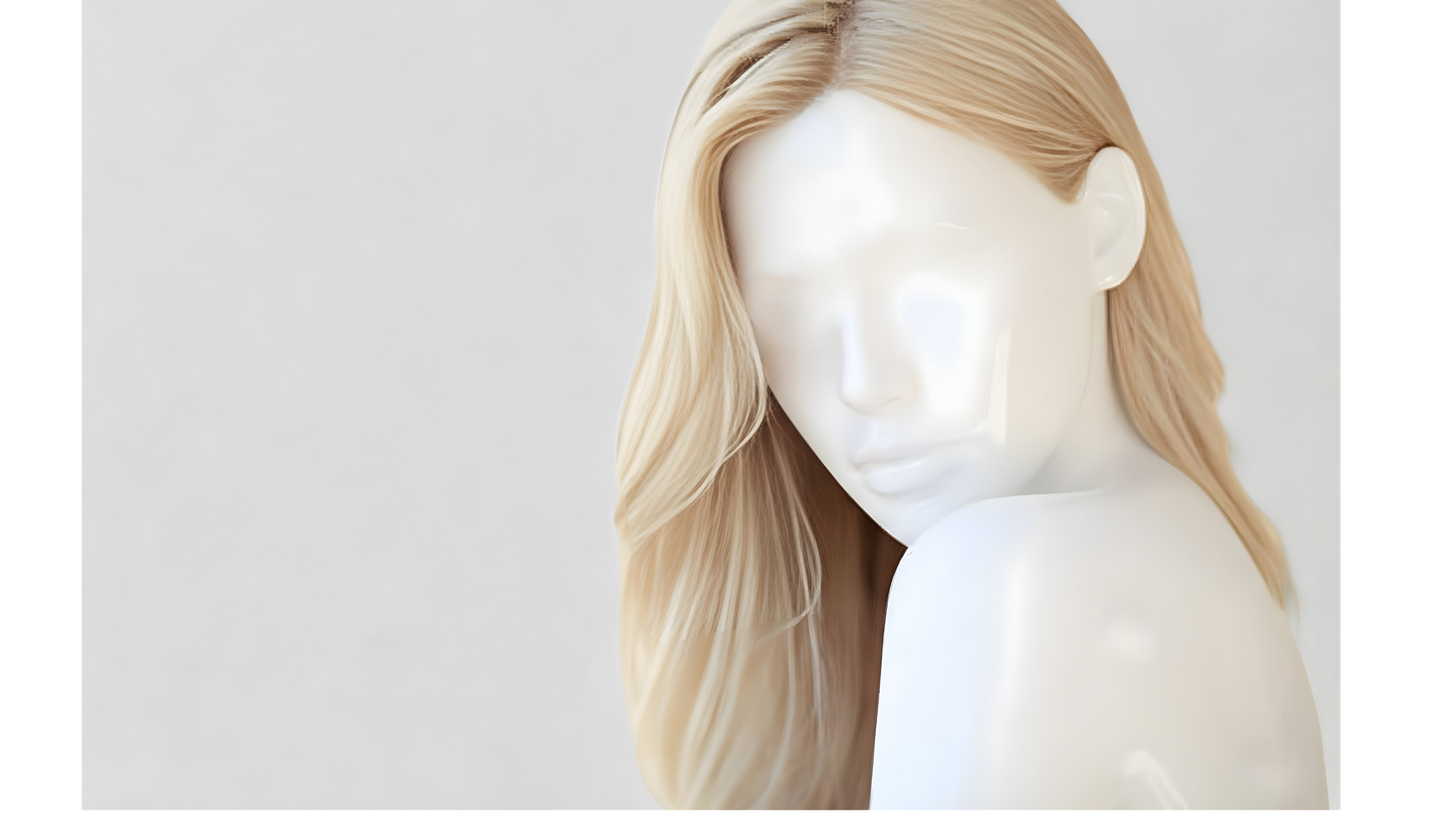 Blonde wavy hair styling mannequin at Atelier Hair Salon Milford MA - hair color and highlights