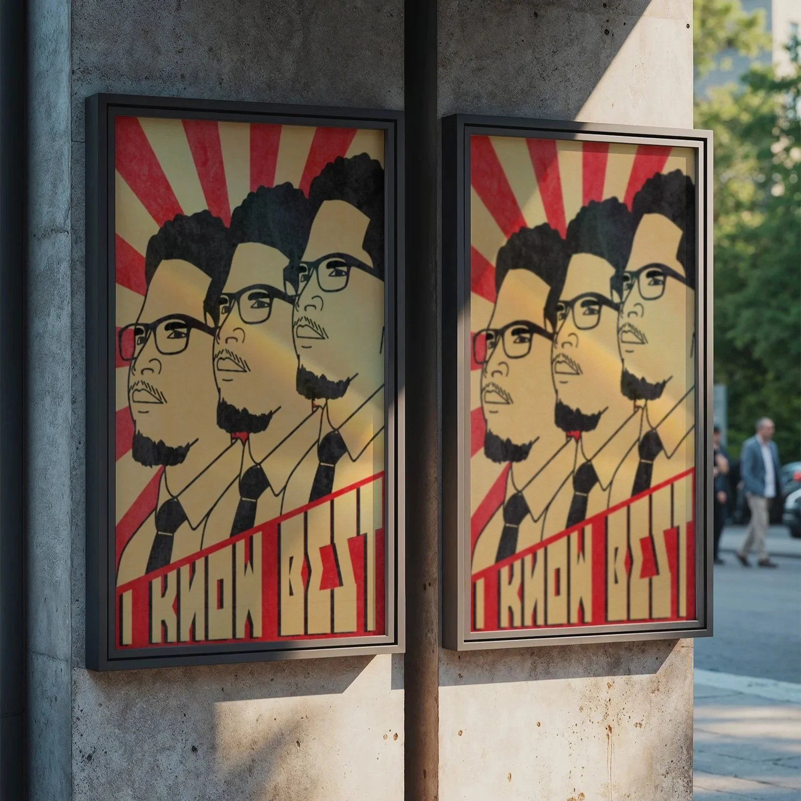 Street posters featuring illustrated portraits of three men with different hairstyles and glasses, set against a retro red and yellow sunburst background, with text in a stylized font at the bottom.