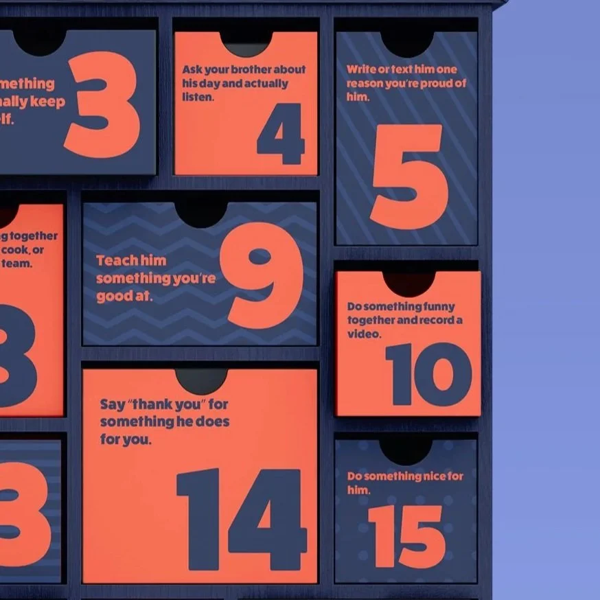 A blue cabinet with numbered drawers containing motivational and encouraging messages for fathers, such as asking about their day, teaching them something, and doing something nice.