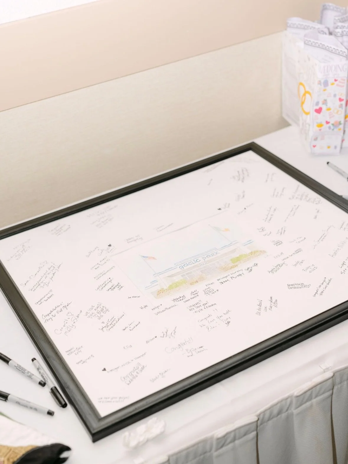 Here I am, emotional over handwritten notes again 🥲🤍 This custom Gaelic Park painting for K+T started as a watercolor illustration and ended the night filled with messages from all the people who love them most. Easily one of my favorite kinds of k
