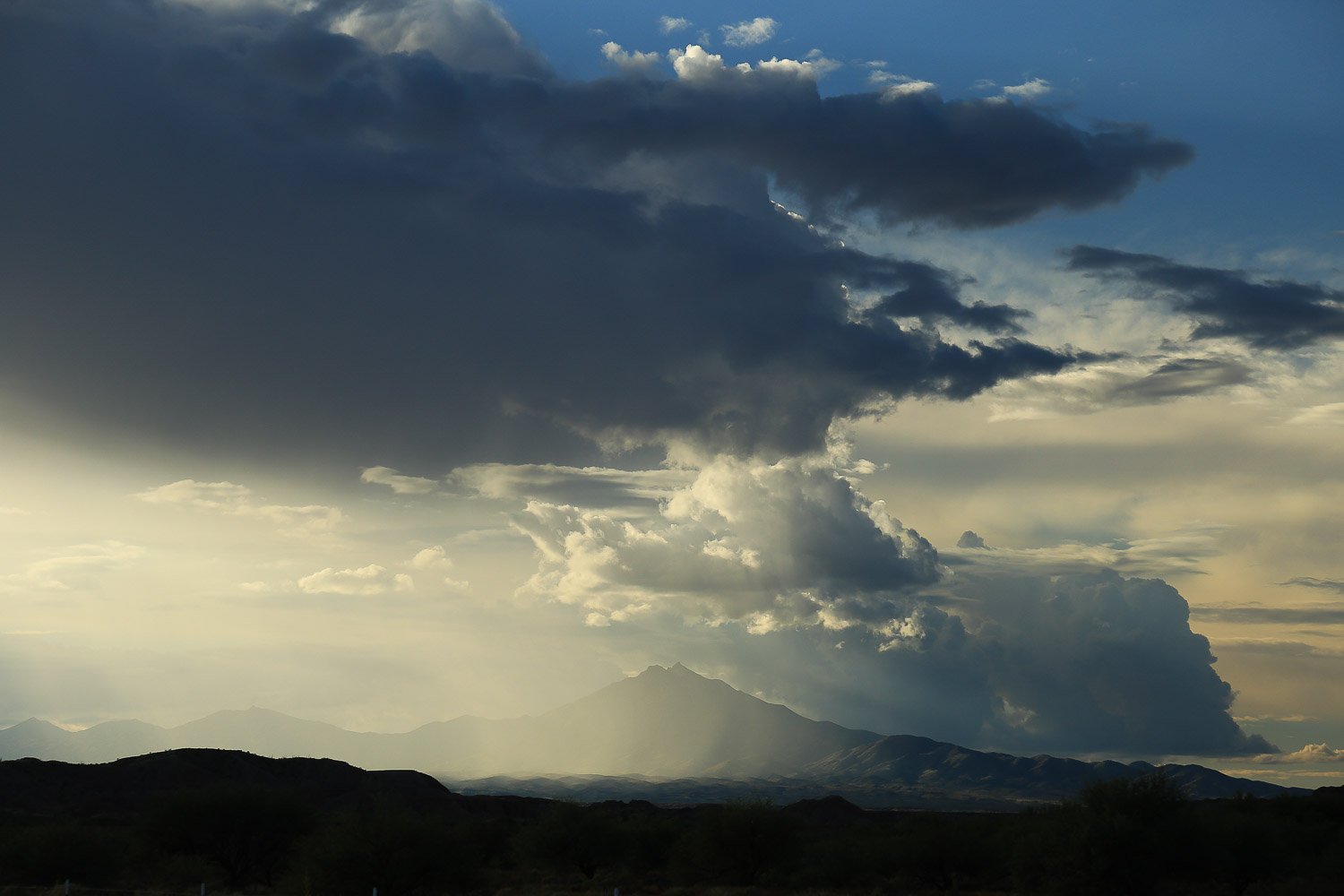 Turnbull Peak near Safford receives a summer soaking. 