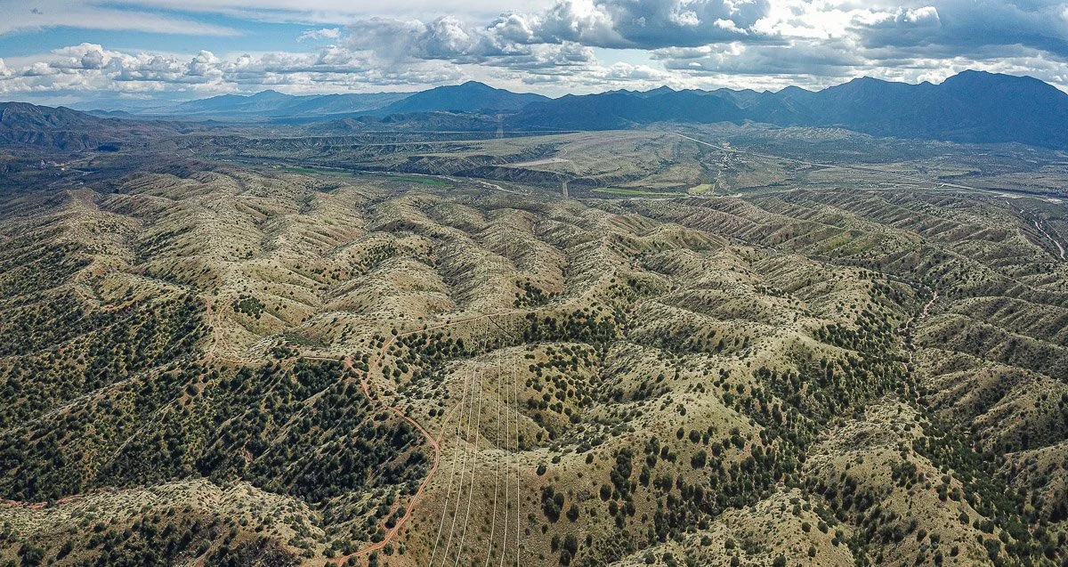 A large, ancient alluvial fan south of Payson is dissected by numerous deep gullies and dotted with pinon-juniper.  