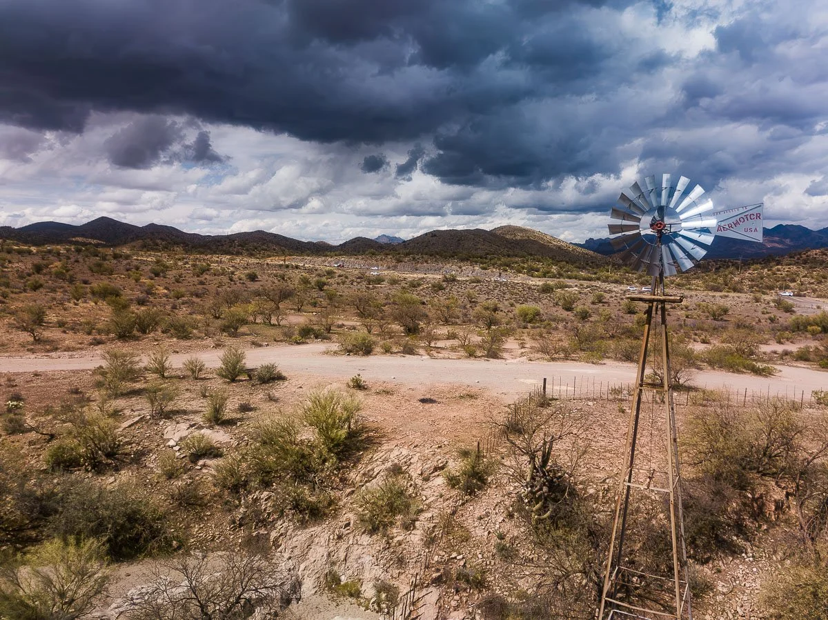 A lonely windmill awaits a summer storm near the mining town of Superior. 