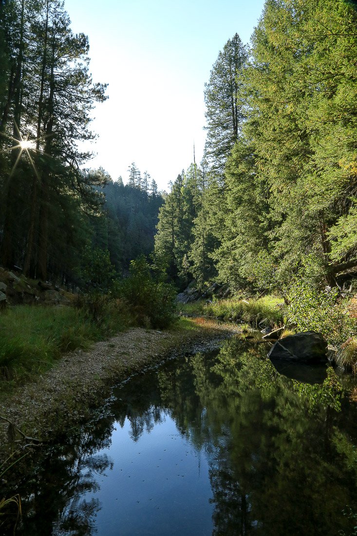 Sunrise over pools of water along East Clear Creek near Jones Crossing.