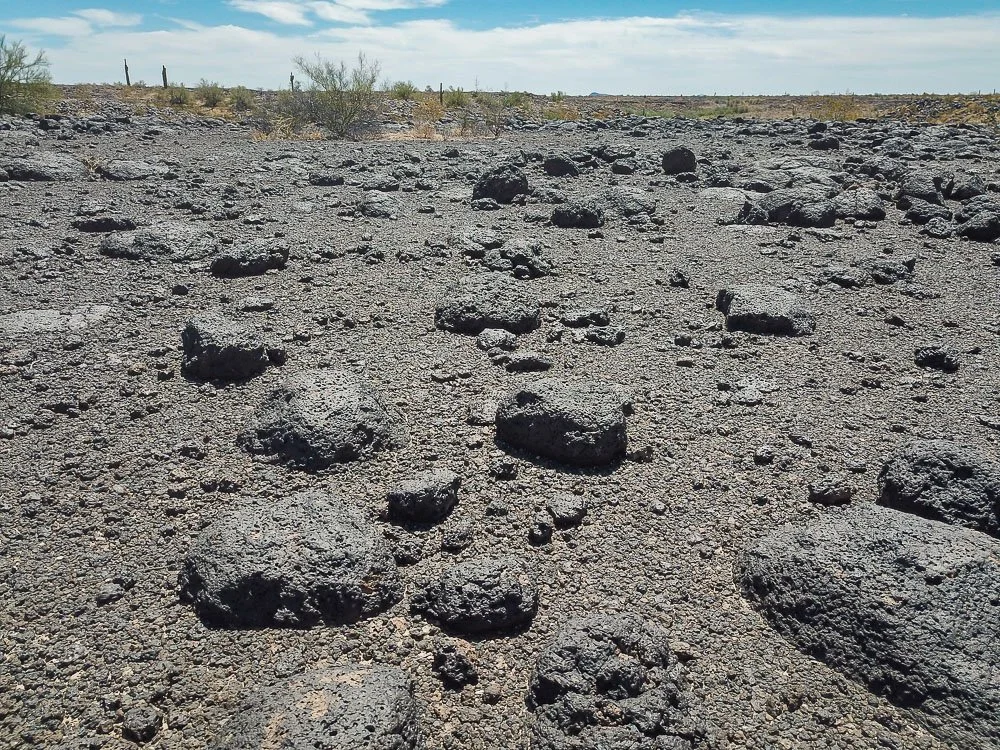 Close-up of the dark, barren, volcanic moonscape west of Sentinel. 