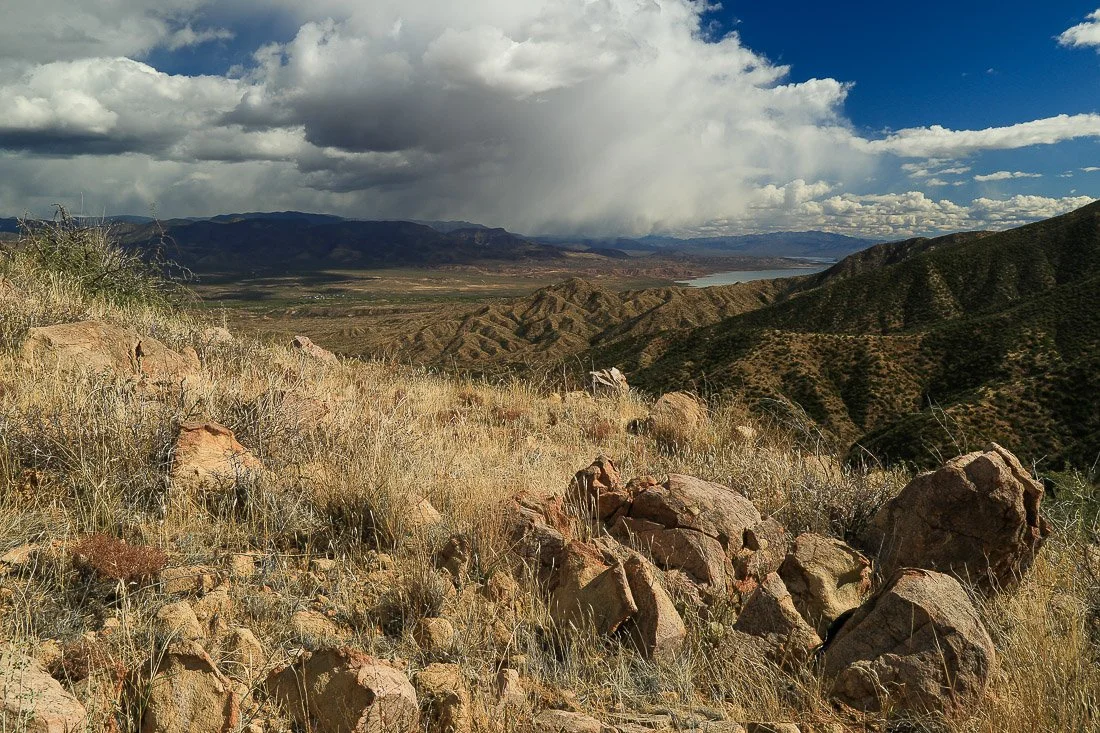 Angular boulders and dry grass await a Spring storm in the southern Mazatzal Mountains near Sycamore Creek. 