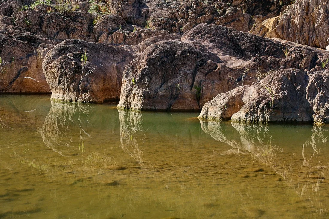 Mirrored reflections of bedrock in Tonto Creek. 