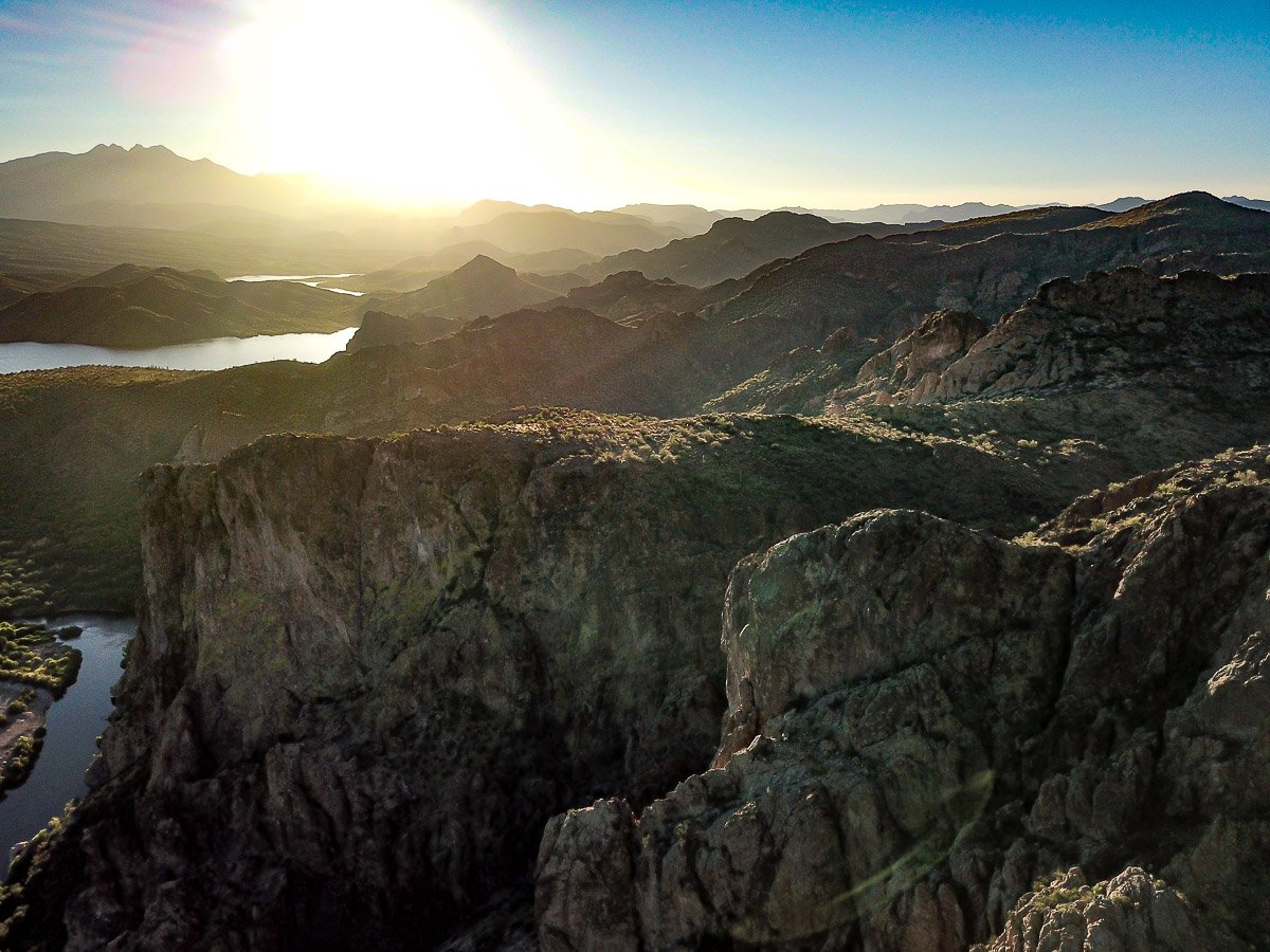 Sunrise over the jumbled volcanic rocks of the Goldfield Mountains near Saguaro Lake. 