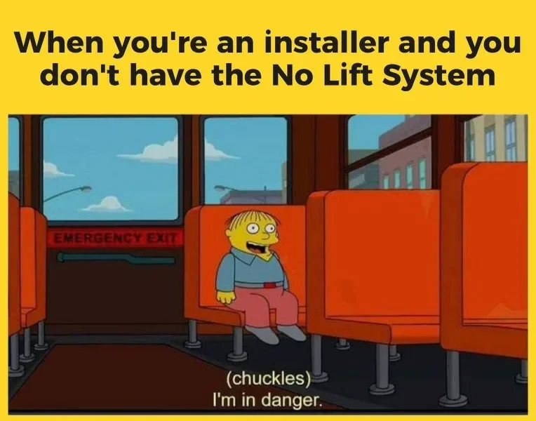 A cartoon of Ralph Wiggum sitting on a school bus, with a sign that reads "Emergency Exit" behind him. The bus interior has orange seats and large windows showing a blue sky. The text at the top says "When you're an installer and you don't have the N