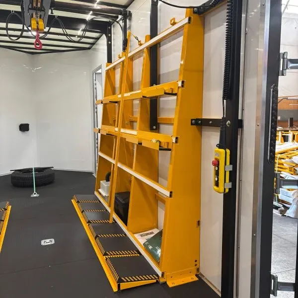 Yellow safety lift or ladder in a fitness or gym facility.