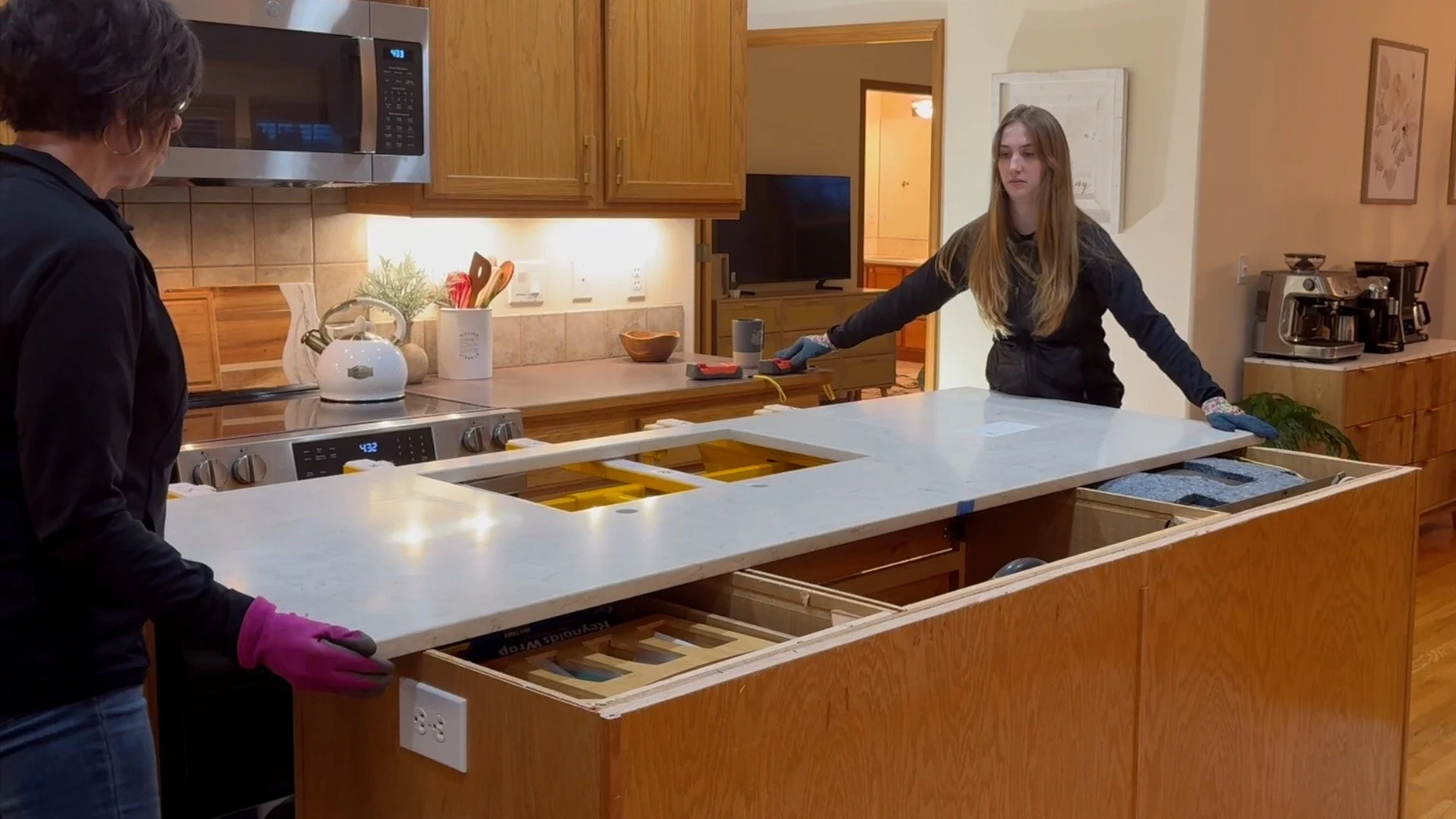 Diane and Julia completing a two-woman quartz island installation using a No Lift System installation cart