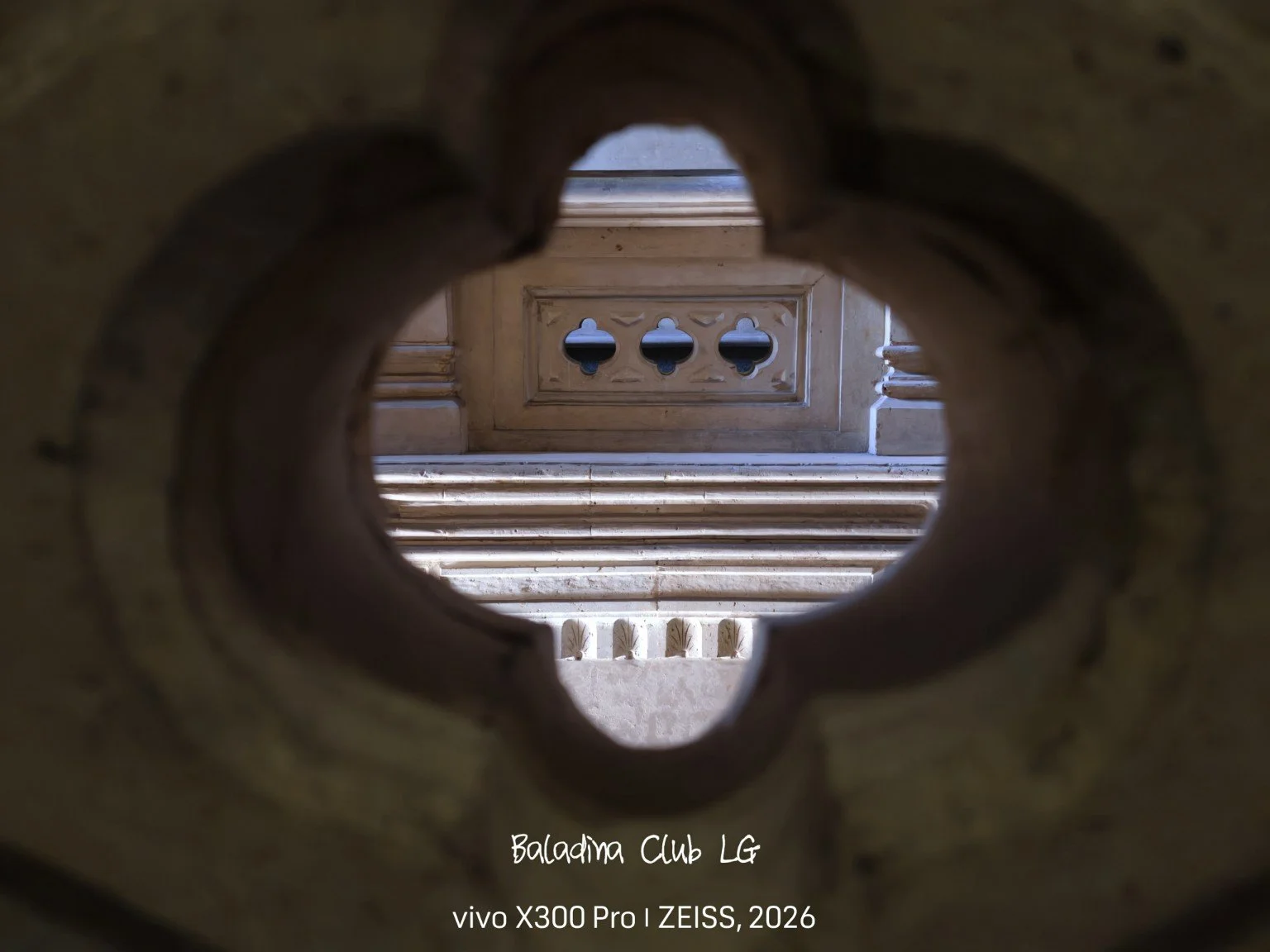 A framed architectural view through a historic Cairo interior