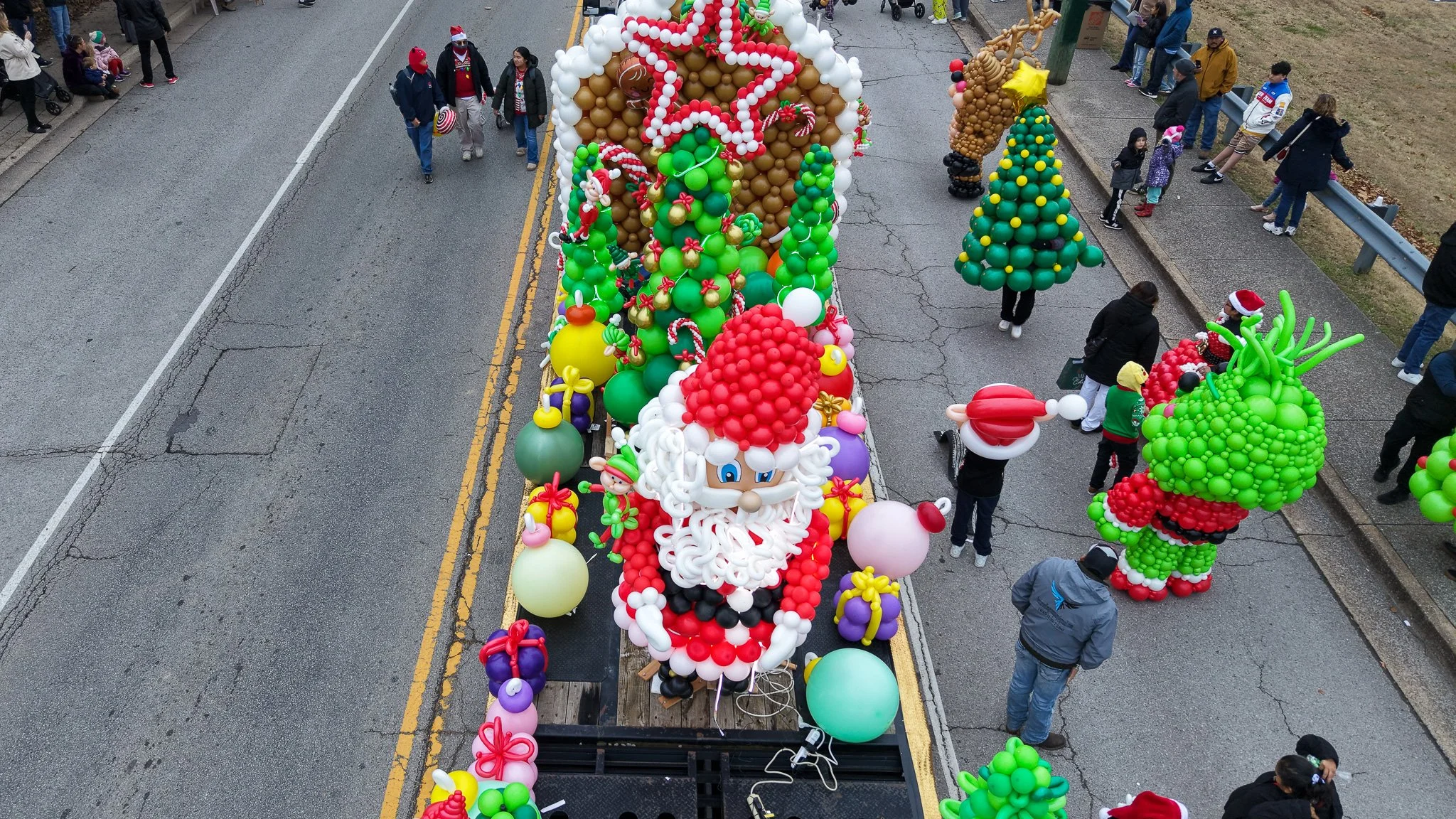 A Christmas parade float decorated.