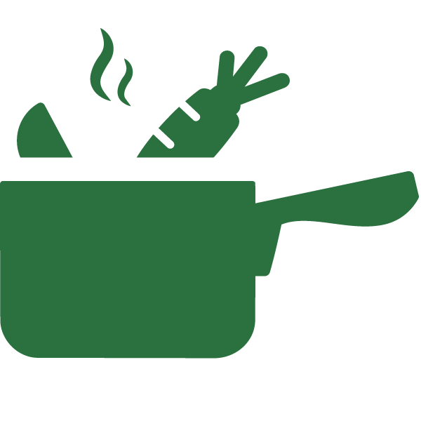 A cooking pot with steam rising, containing a peeled carrot and a broken egg.