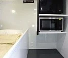 Interior of a bunkhouse rental trailer.