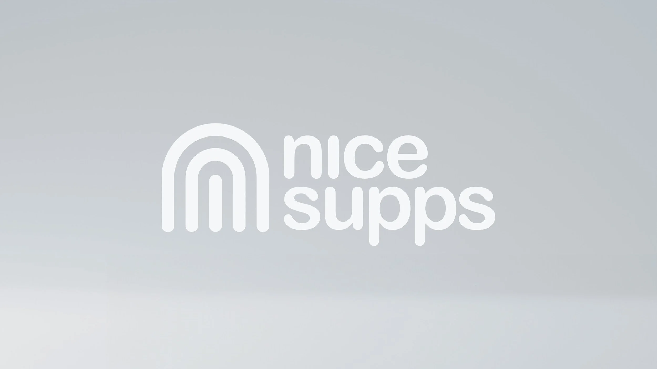 Logo of Nice Squeaks featuring a rainbow design and the words 'nice squeaks' in lowercase letters.