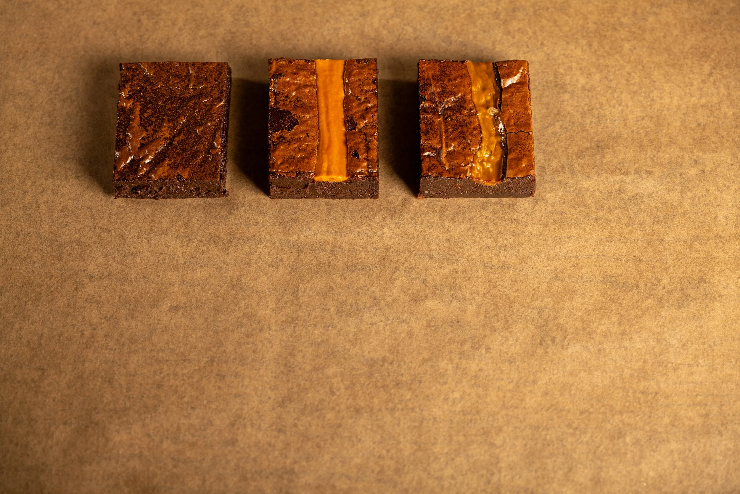 Our trio of brownie flavours - plain dark chocolate, salted caramel, and Biscoff