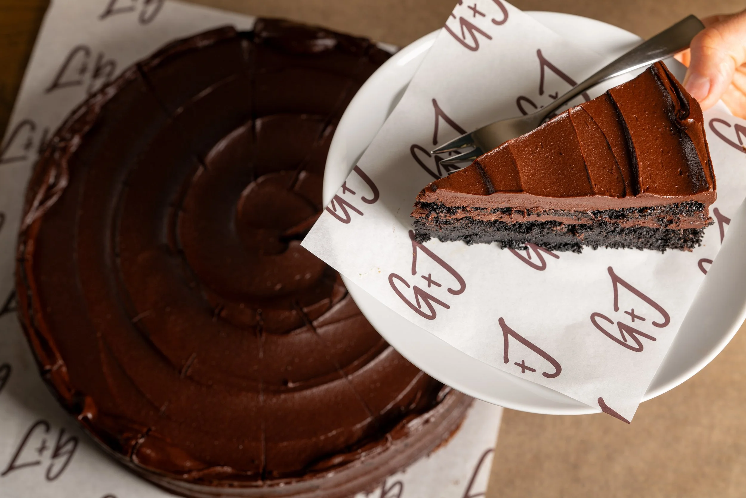 Rich chocolate fudge cake with dark chocolate frosting. 10" cake, serves 12-16.