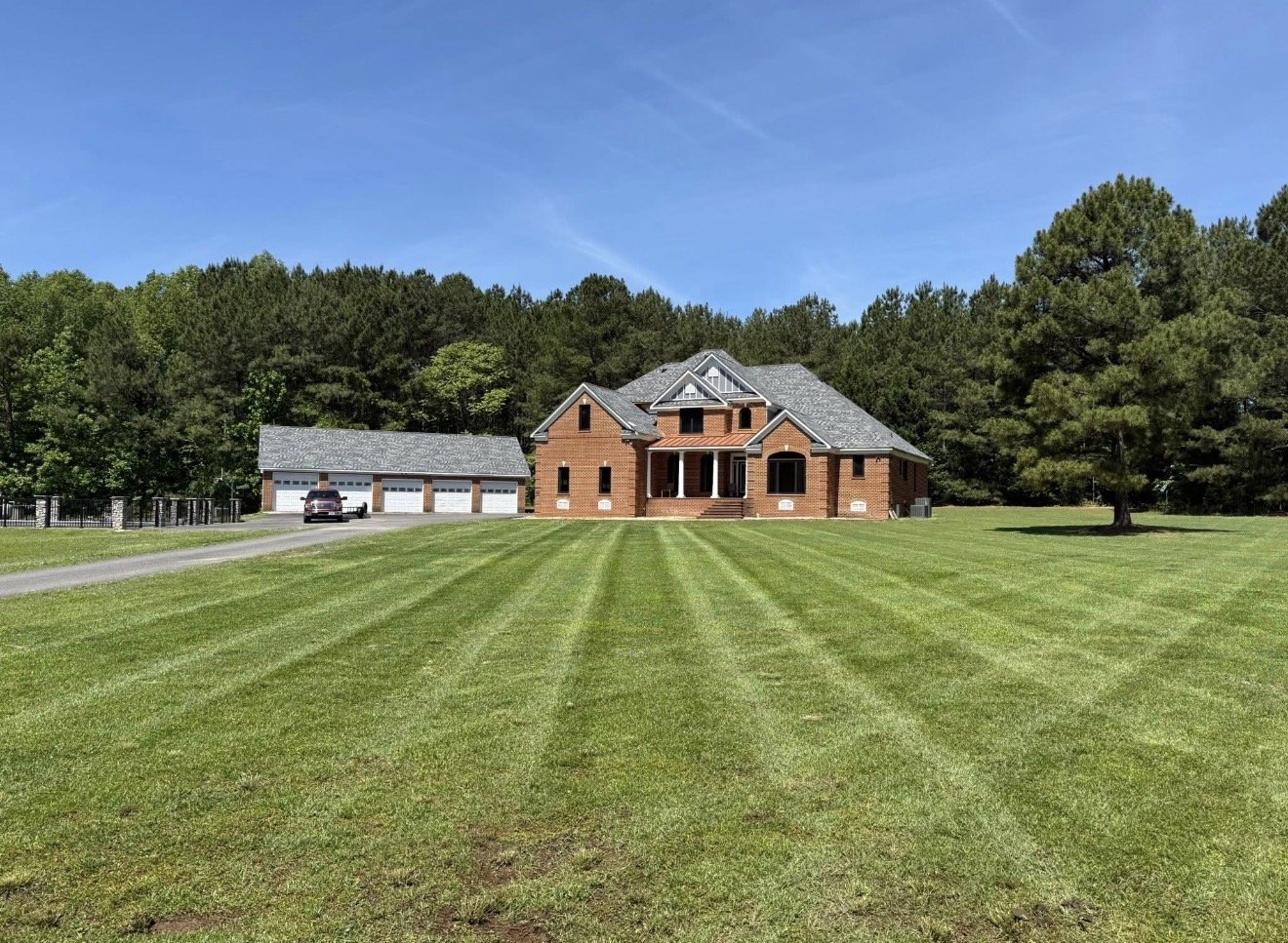 Well maintained yard with beautiful home