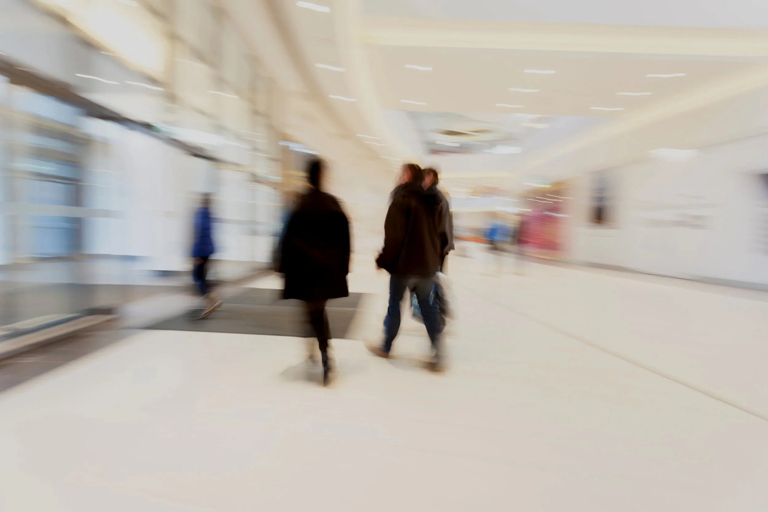 Blurred image of people in an office