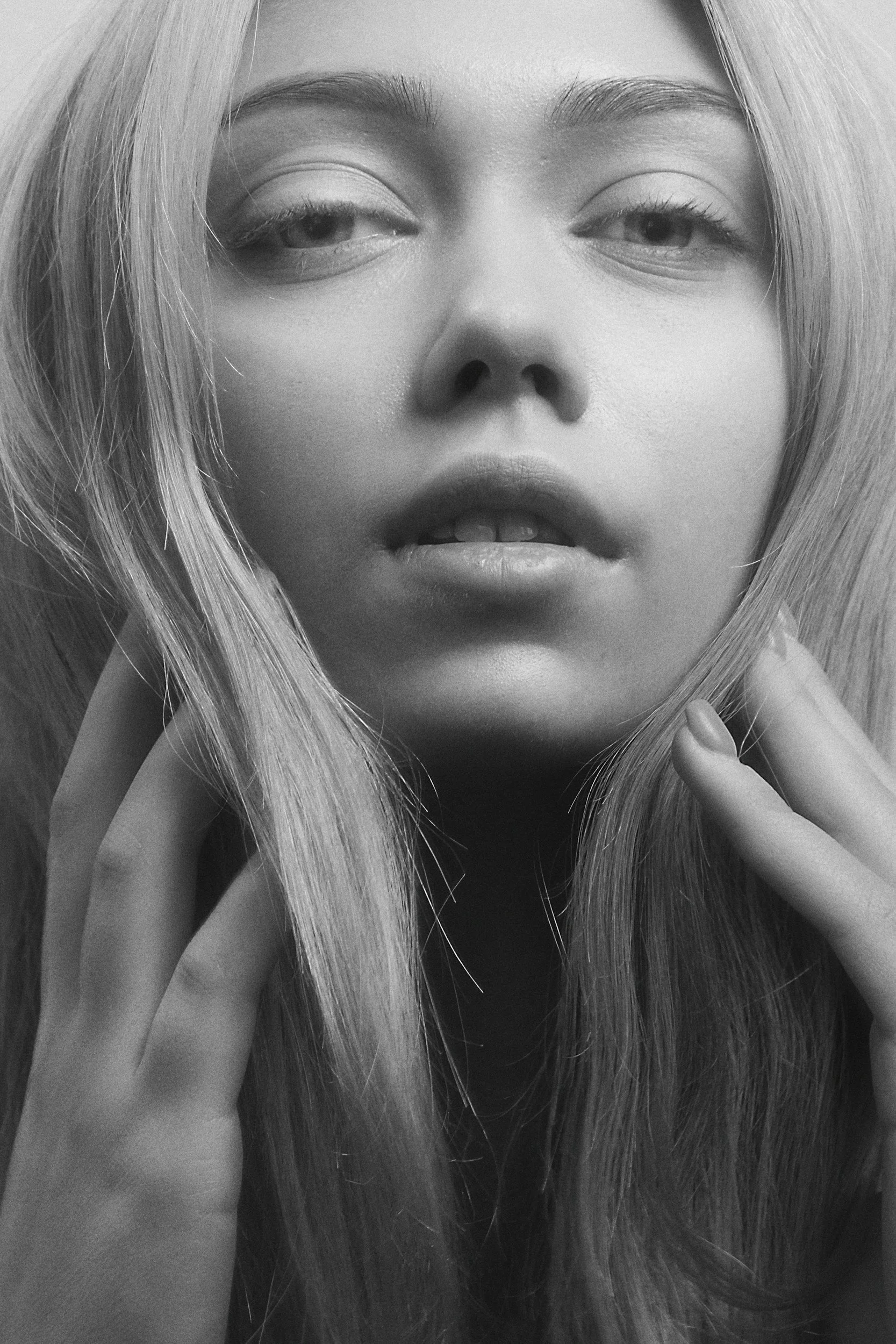 Close-up of a woman with smooth, radiant skin showing the rejuvenation results of professional dermaplaning and microneedling treatments at RAW Rejuvenation Aesthetics and Wellness in Chambersburg PA.