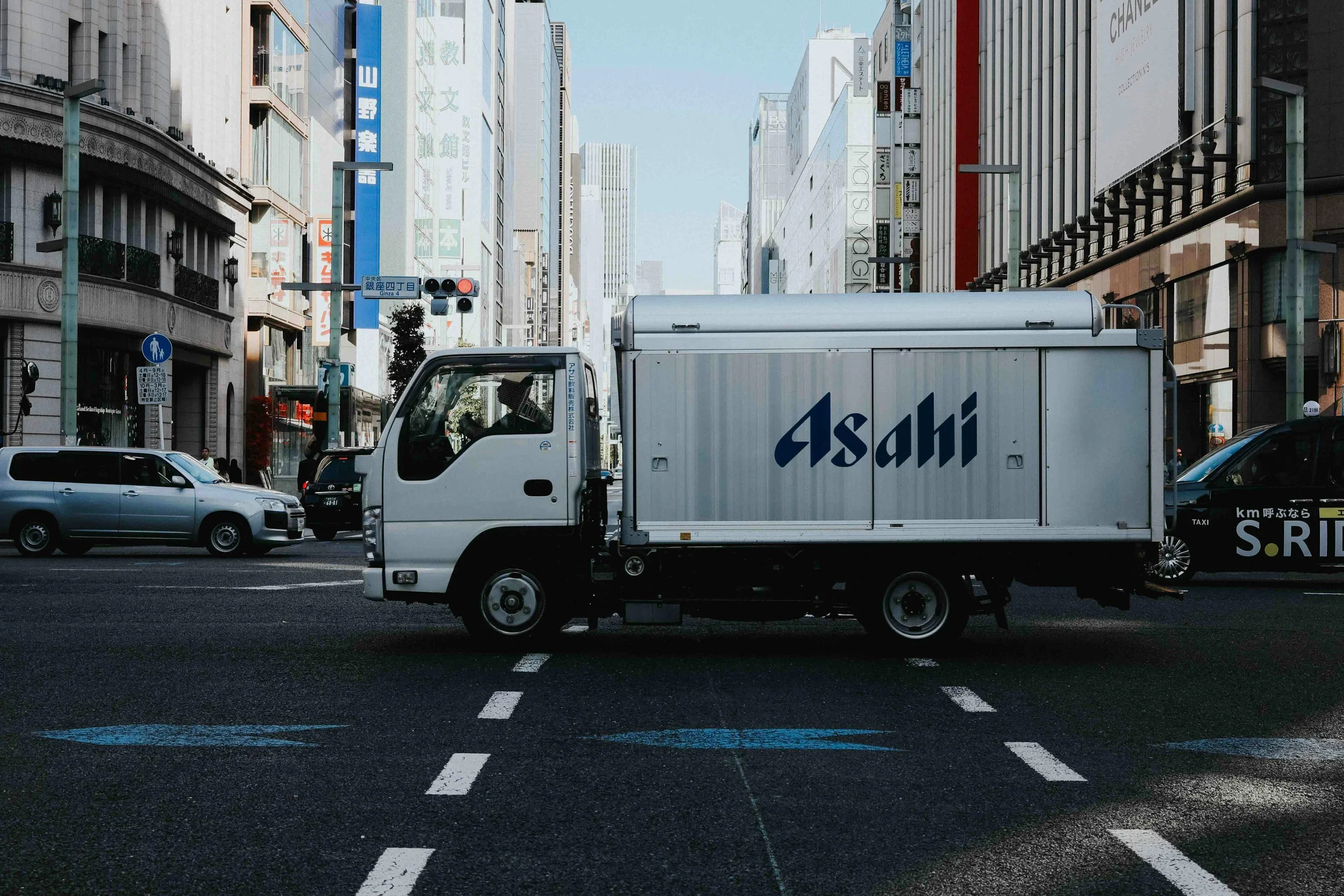 Commercial delivery truck driving on a road