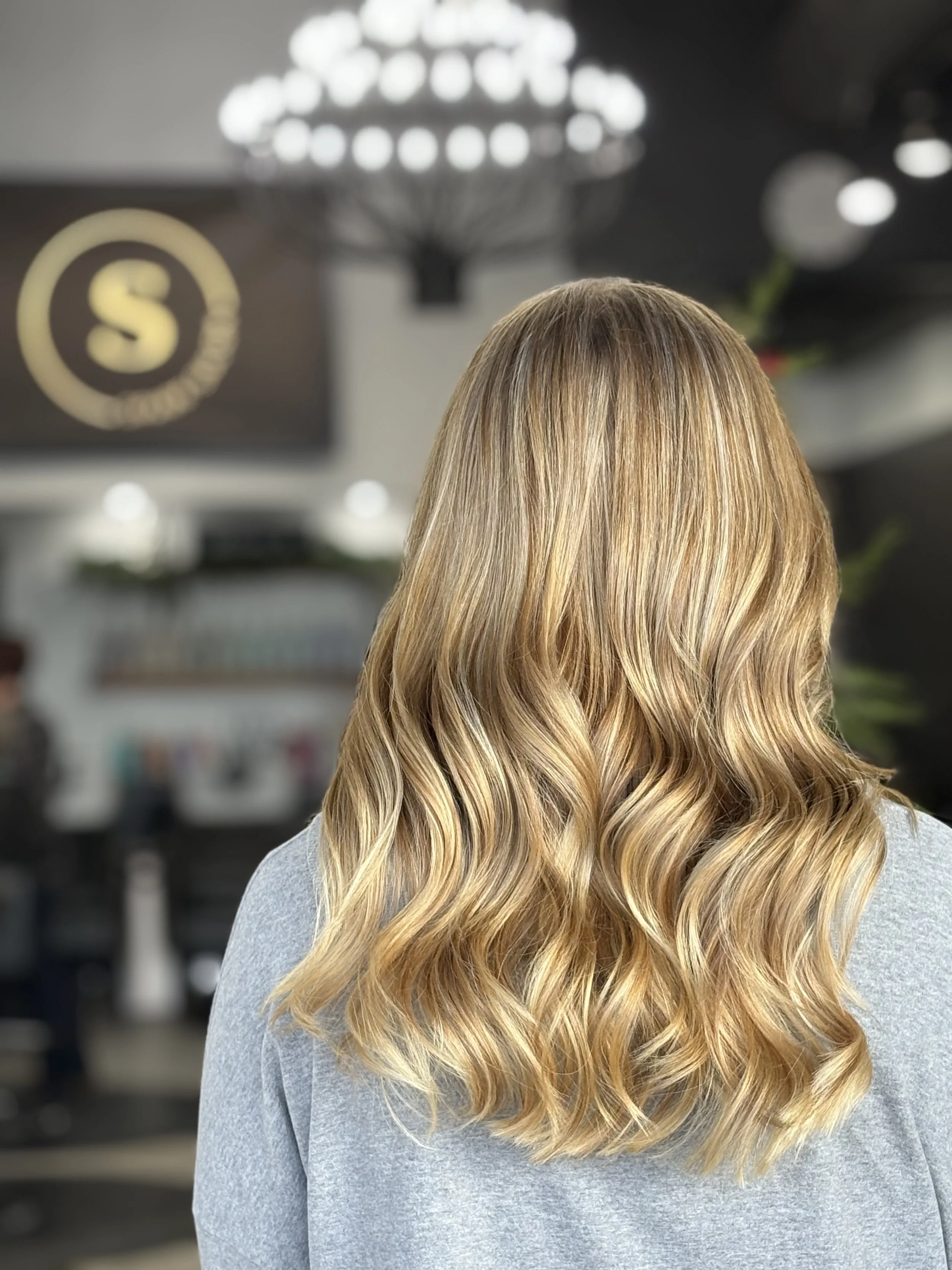 the hair district, spark salon, balayage, blonde hair, brunette dimension, hand painted highlights, surface painting, sunkissed hair color, blonding