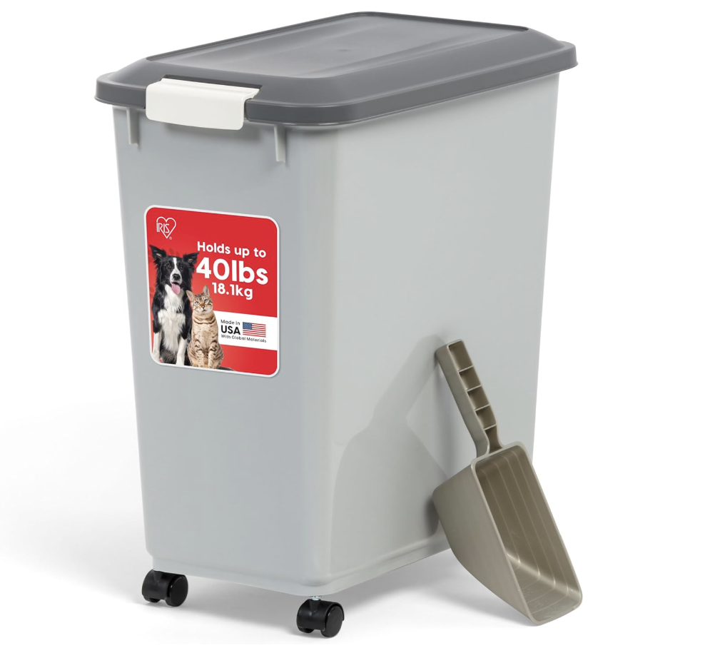A plastic trash bin with a swinging lid and a scoop attached to the side, labeled for pet waste disposal, capable of holding up to 40 pounds or 18.1 kilograms.