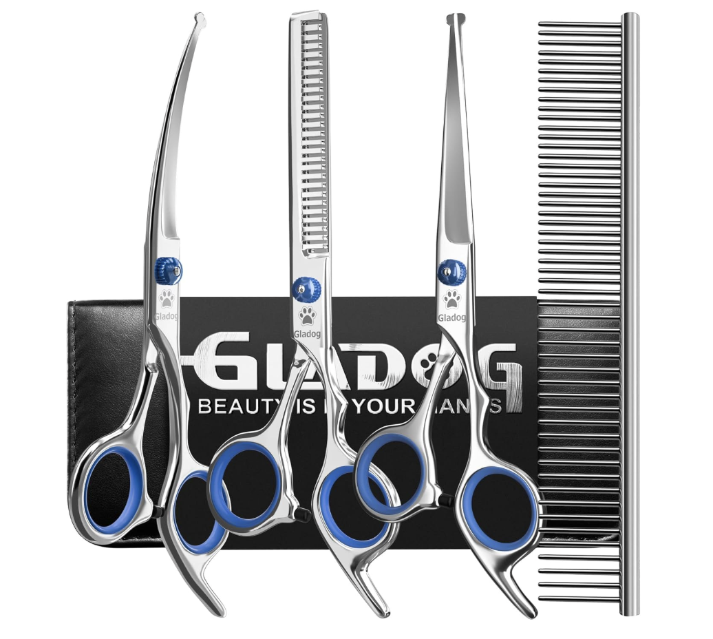 Set of four silver and blue hair scissors and a silver comb on a black case.