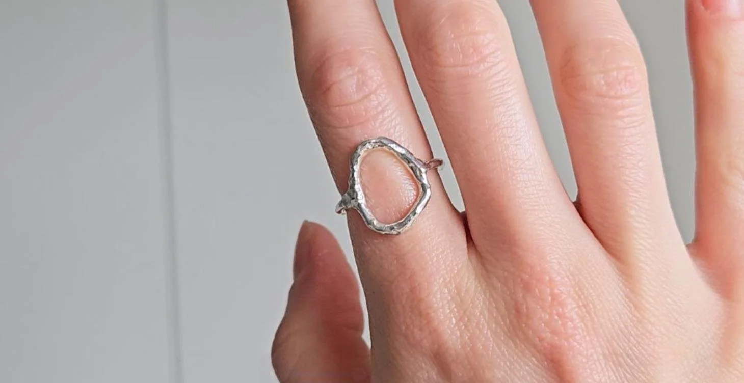 abstract ring on finger