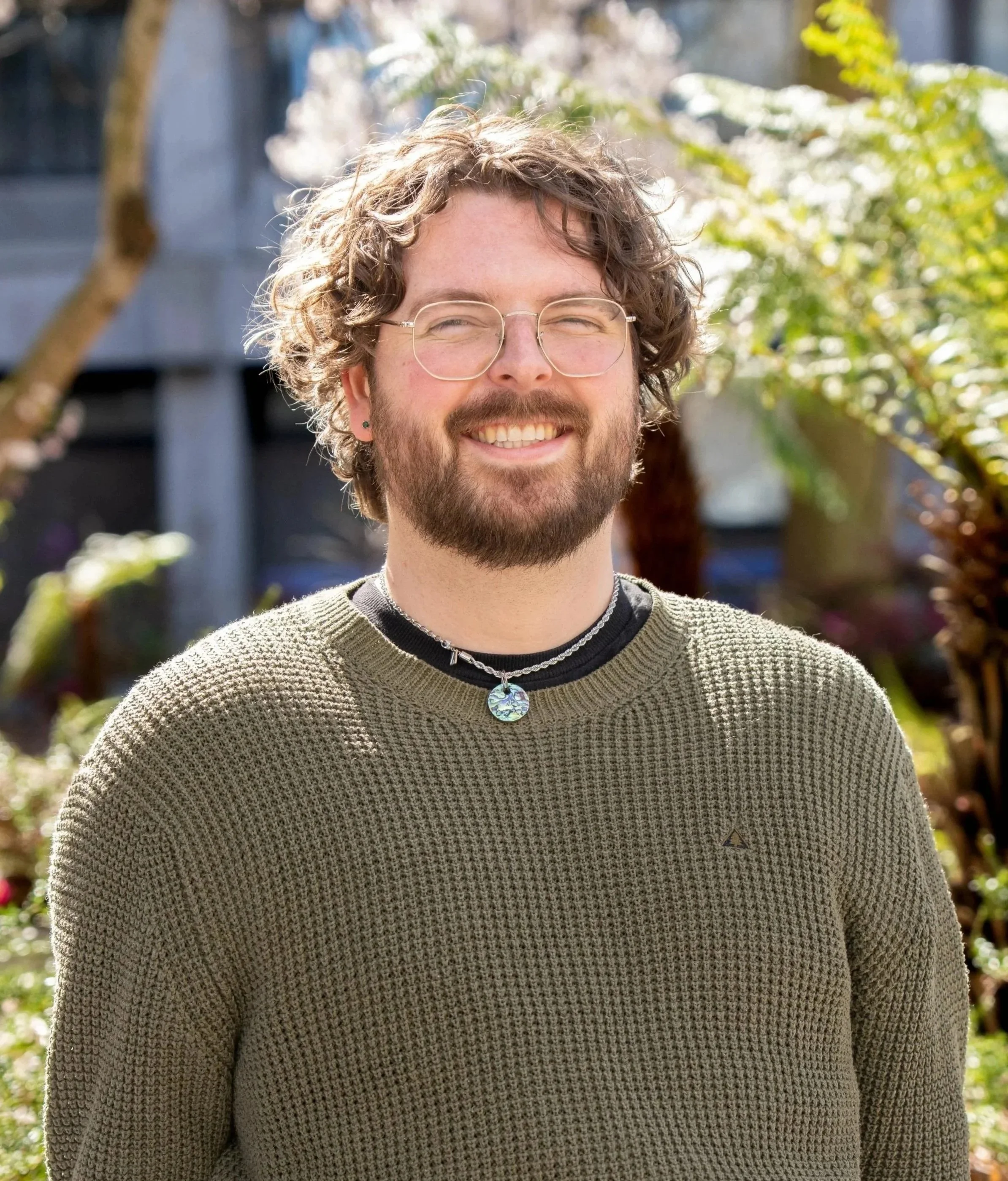 Ben Williams, organisational psychology consultant, smiling outdoors