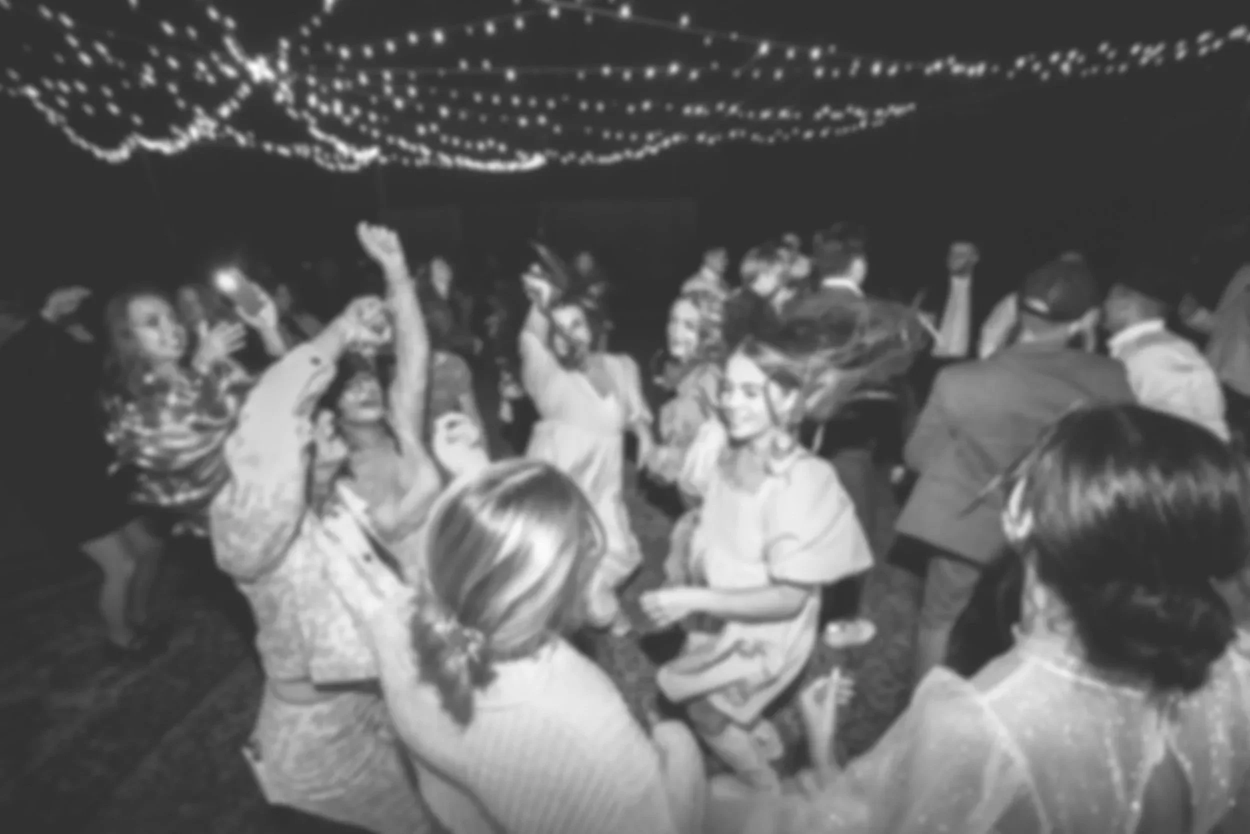 Black and white image of a rave.