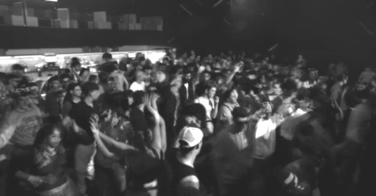Black and white image of a rave.